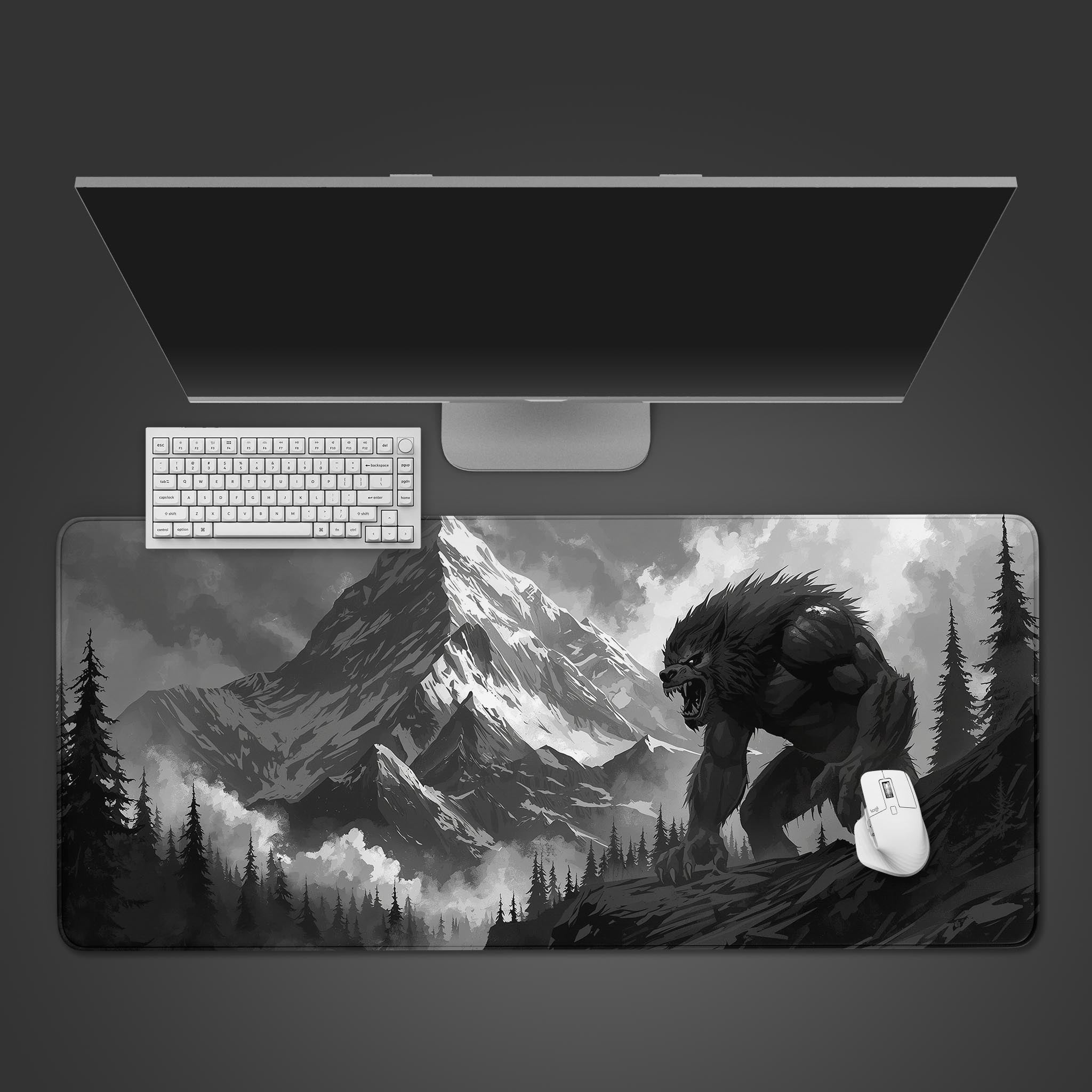 Lunar Beast desk mat with werewolf design and mountain scenery – desktop view with keyboard and mouse. - Epic Design Pads