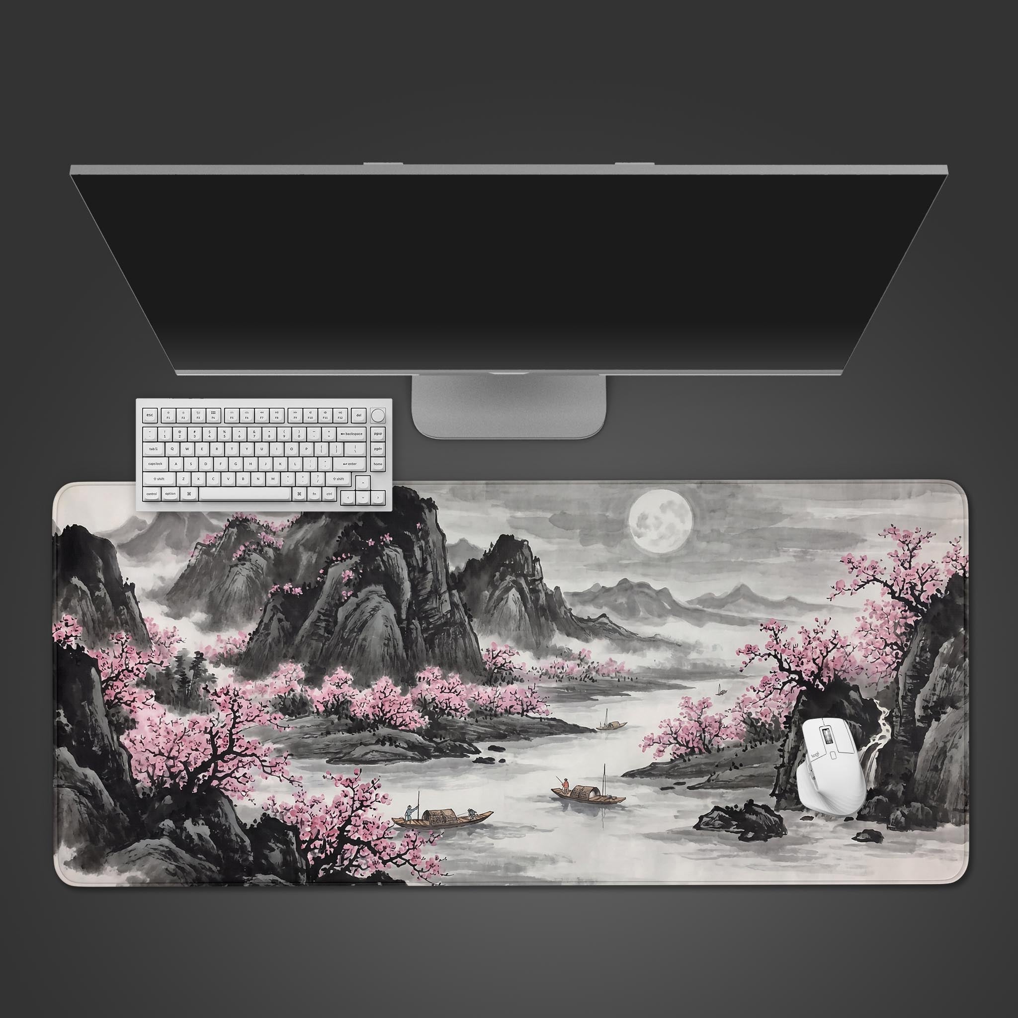 Lunar Blossom Valley desk mat featuring a traditional black and white ink wash mountain landscape with pink cherry blossoms.