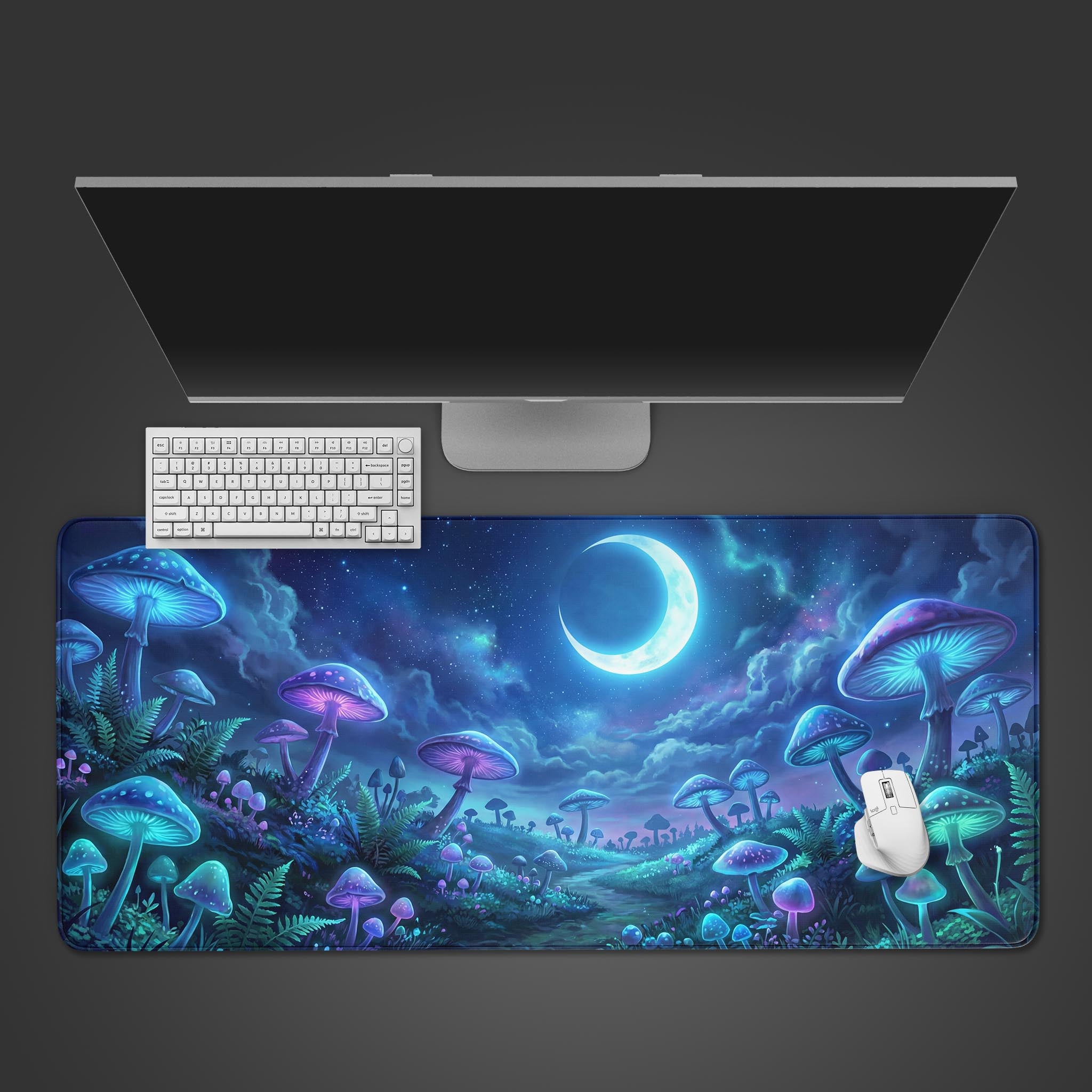 Top-down view of the Lunar Fungi gaming desk mat featuring a magical mushroom forest under a crescent moon, shown with a white keyboard and mouse. - Epic Design Pads & Mousepads