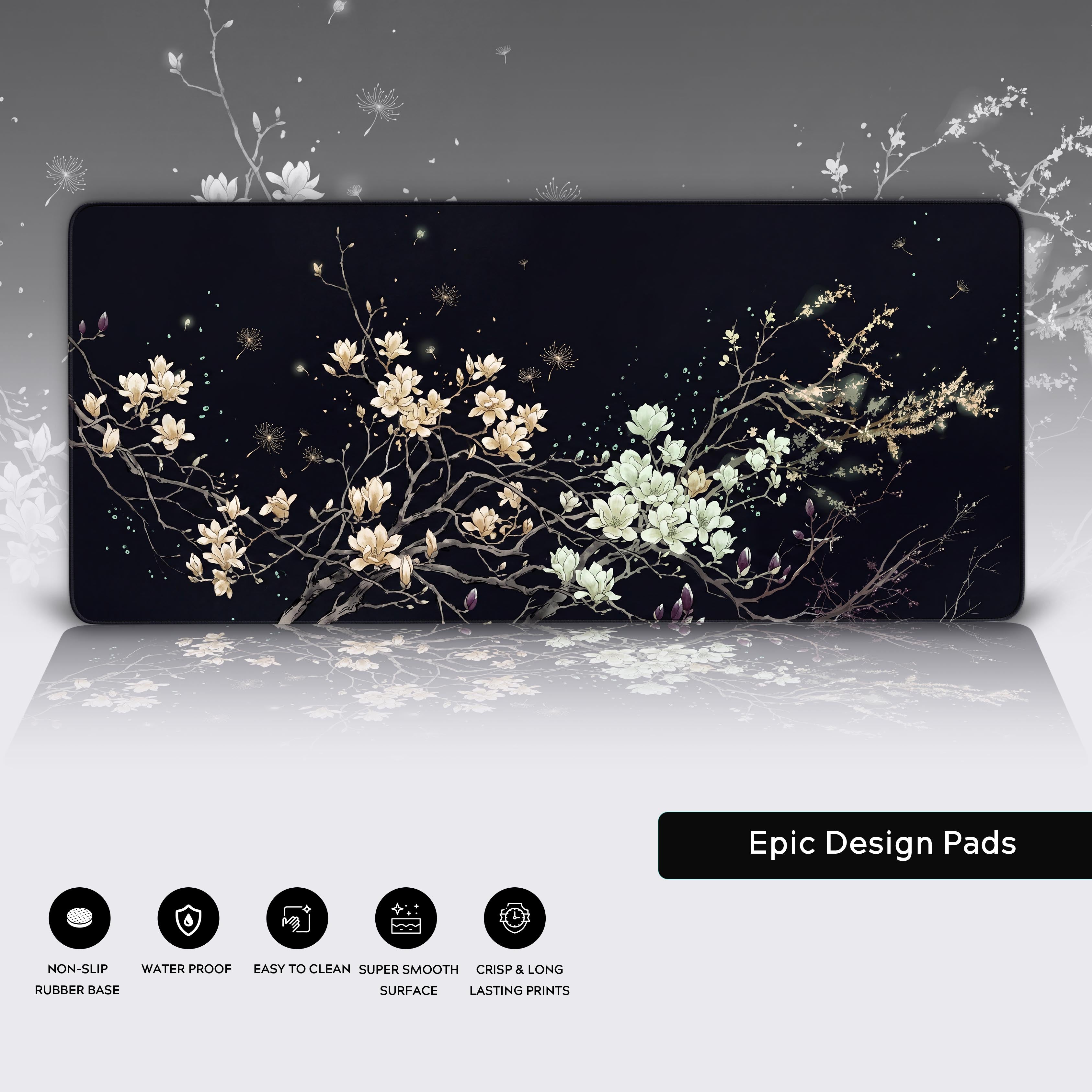 Magnolia branch desk mat displaying its non-slip rubber base and super smooth surface icons