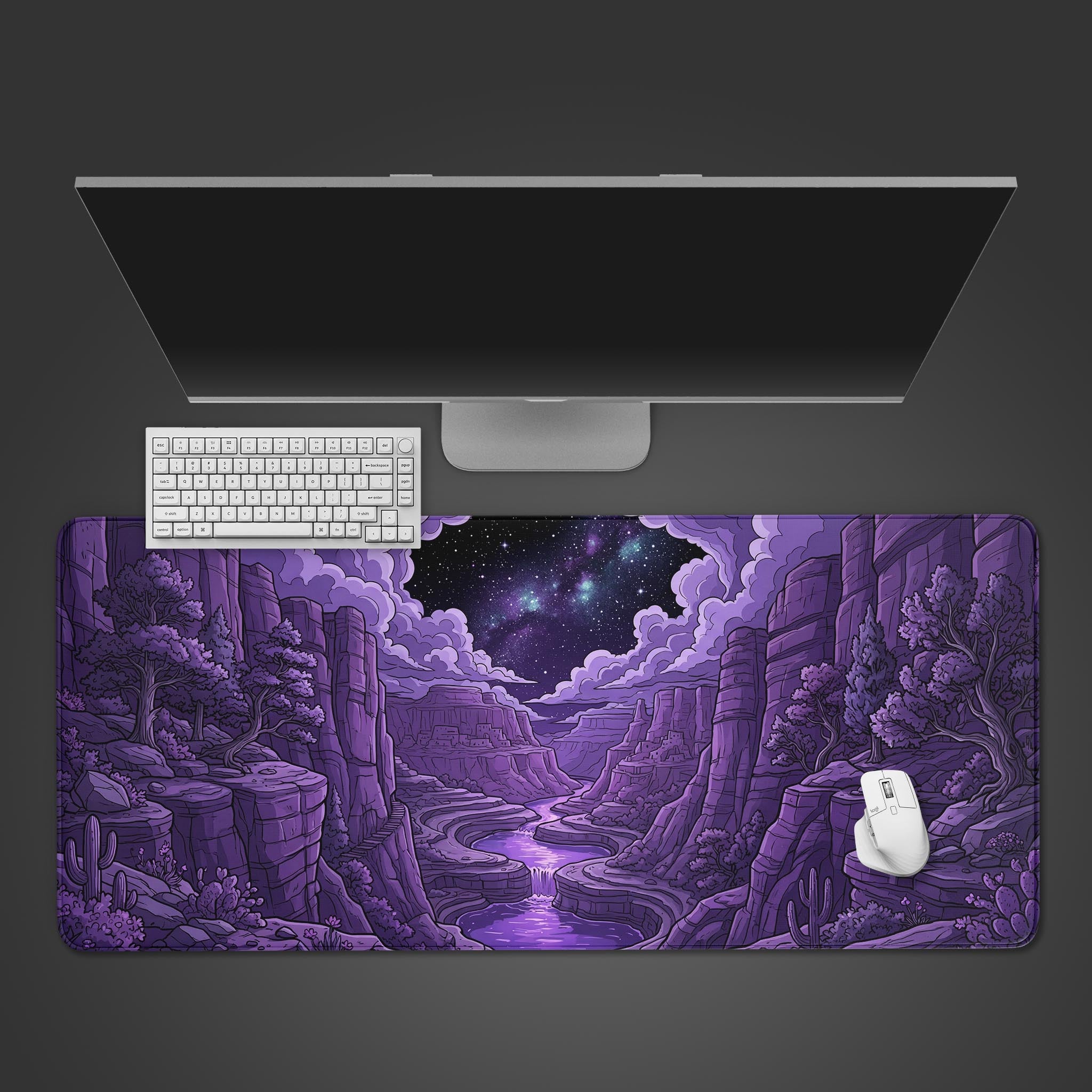 Midnight Canyon desk mat showcasing a purple valley and starry galaxy sky.
