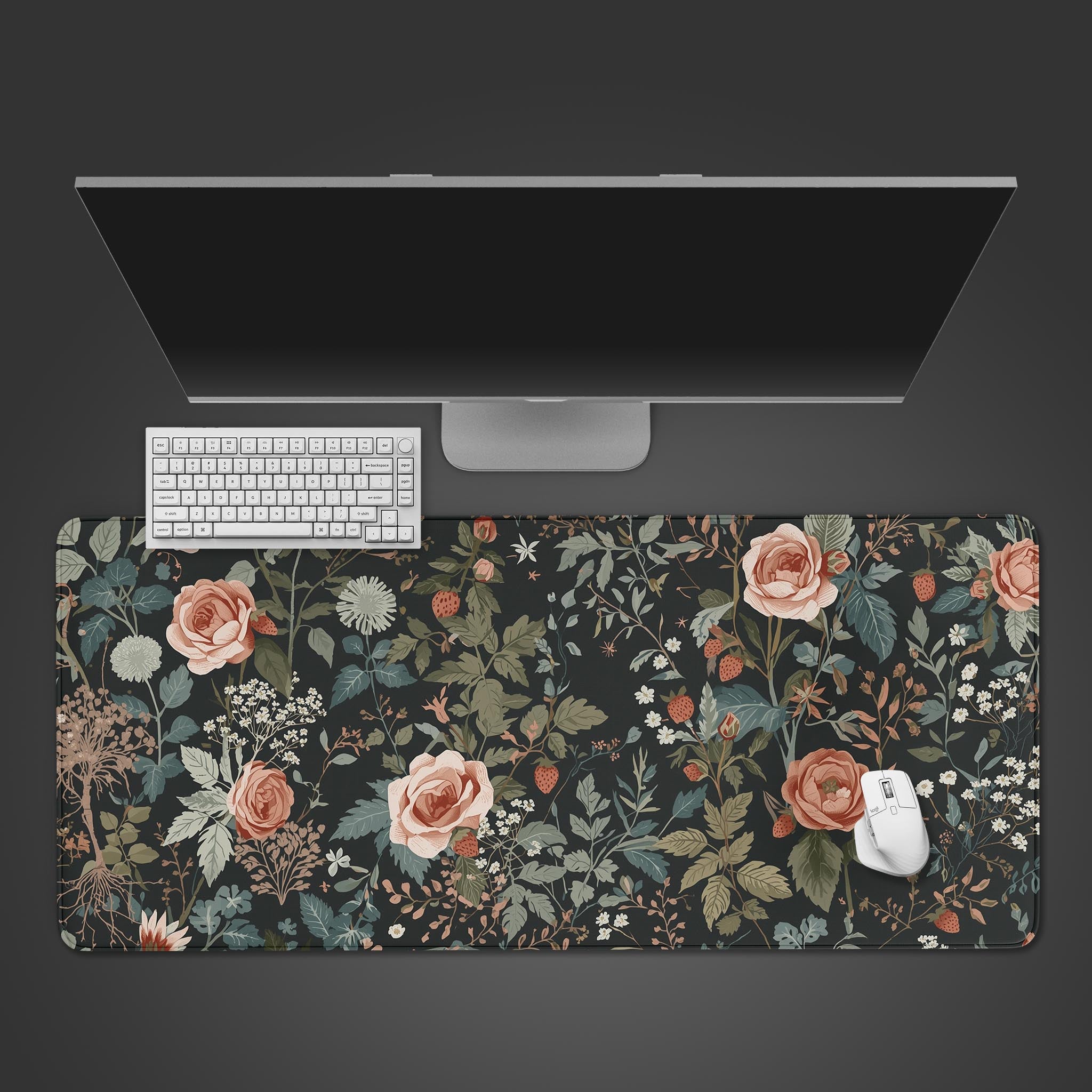 Midnight Garden floral desk mat shown from top-down view with a black keyboard and mouse, highlighting the dark botanical pattern. - Epic Design Pads