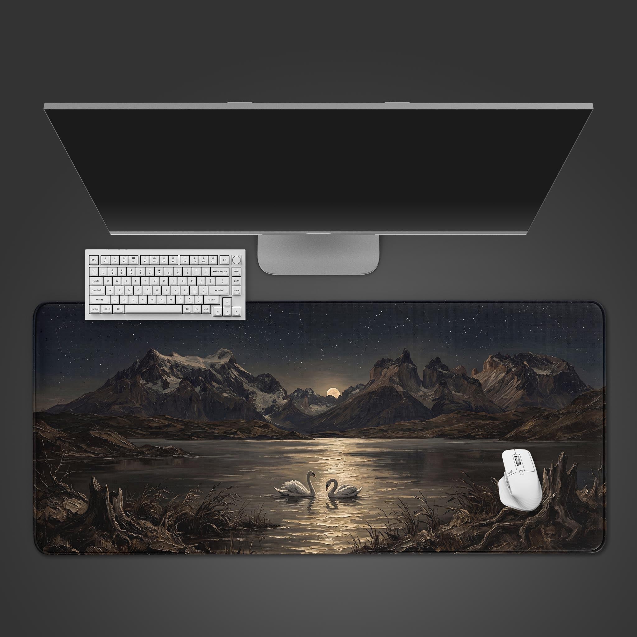 Moonlight Swans desk mat showcasing a fine art oil painting of a serene mountain lake