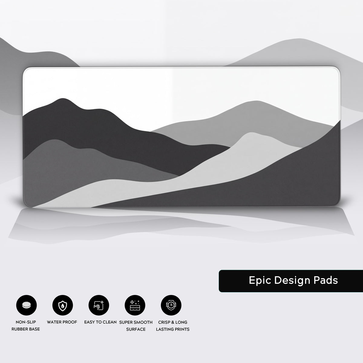 Grayscale abstract mountain desk mat mockup showcasing a clean, minimalist workspace aesthetic.