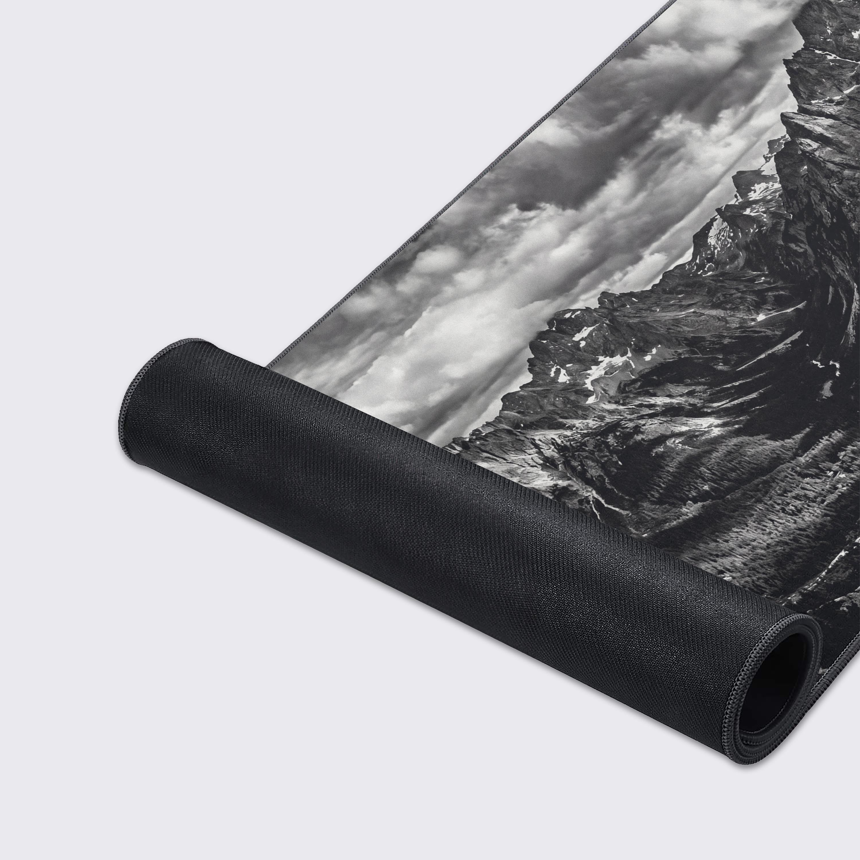 Features of the desk mat including non-slip rubber base, waterproof surface, and crisp long-lasting prints.