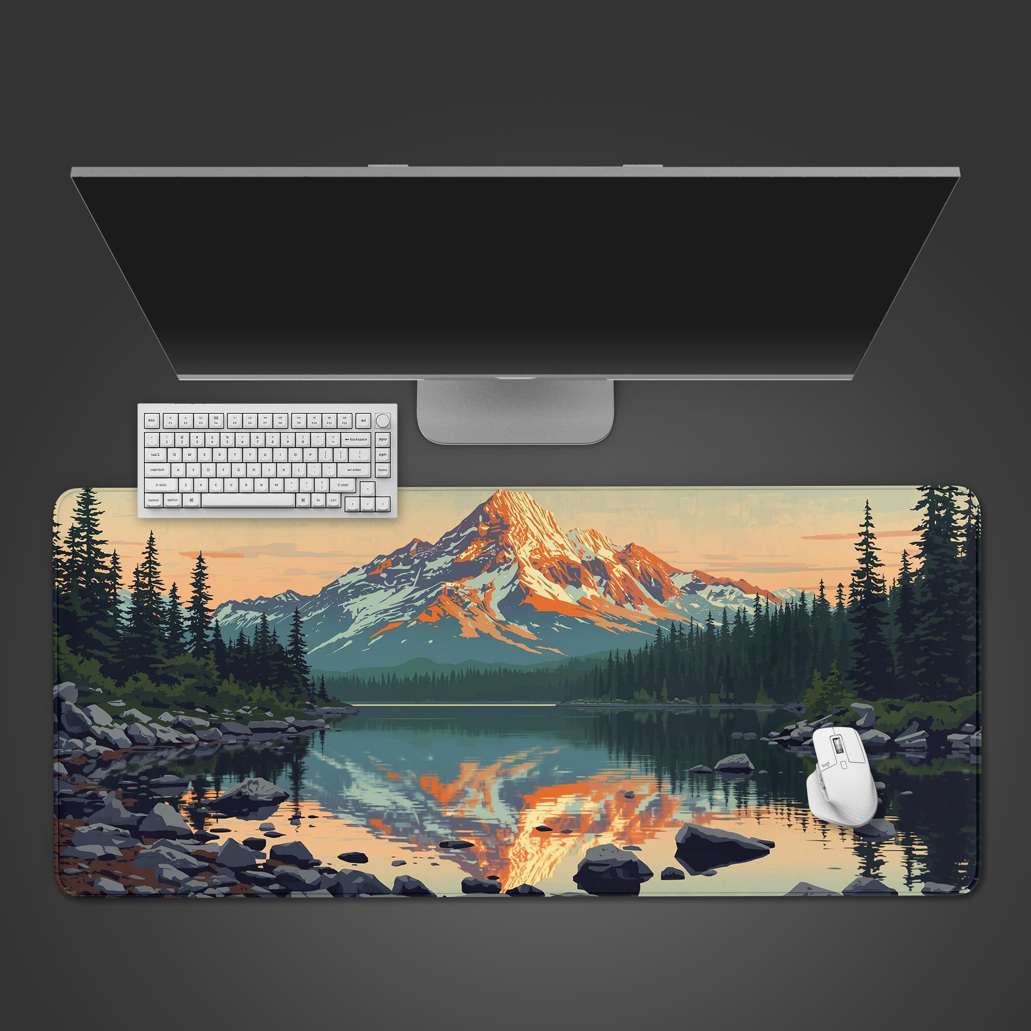 Mountain Sunset desk mat with alpine peak design, shown in a desktop view with a black keyboard and white mouse. - Epic Design Pads