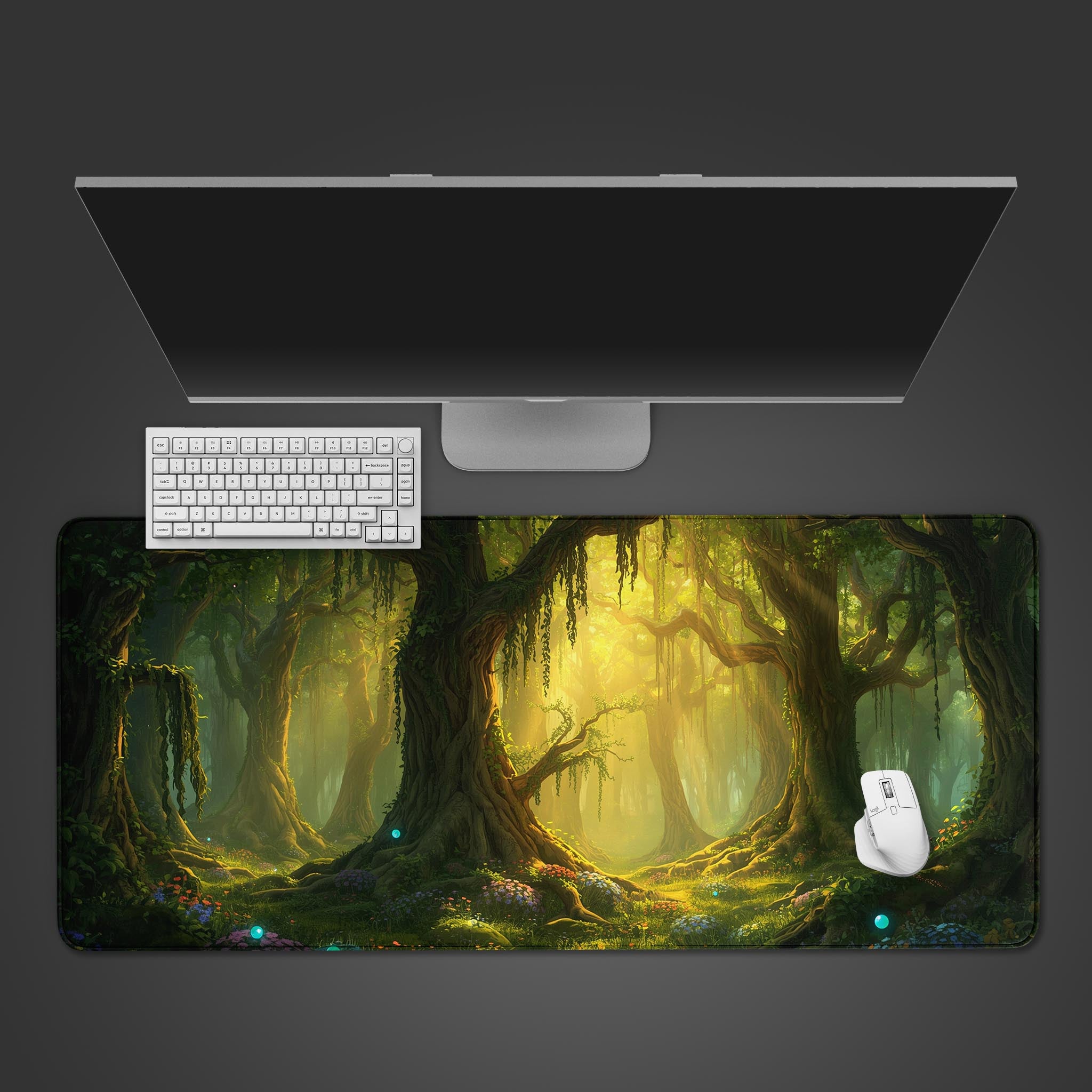 Mystic Forest desk mat showing the enchanted forest design with glowing orbs, viewed from top-down with a white keyboard and mouse. - Epic Design Pads