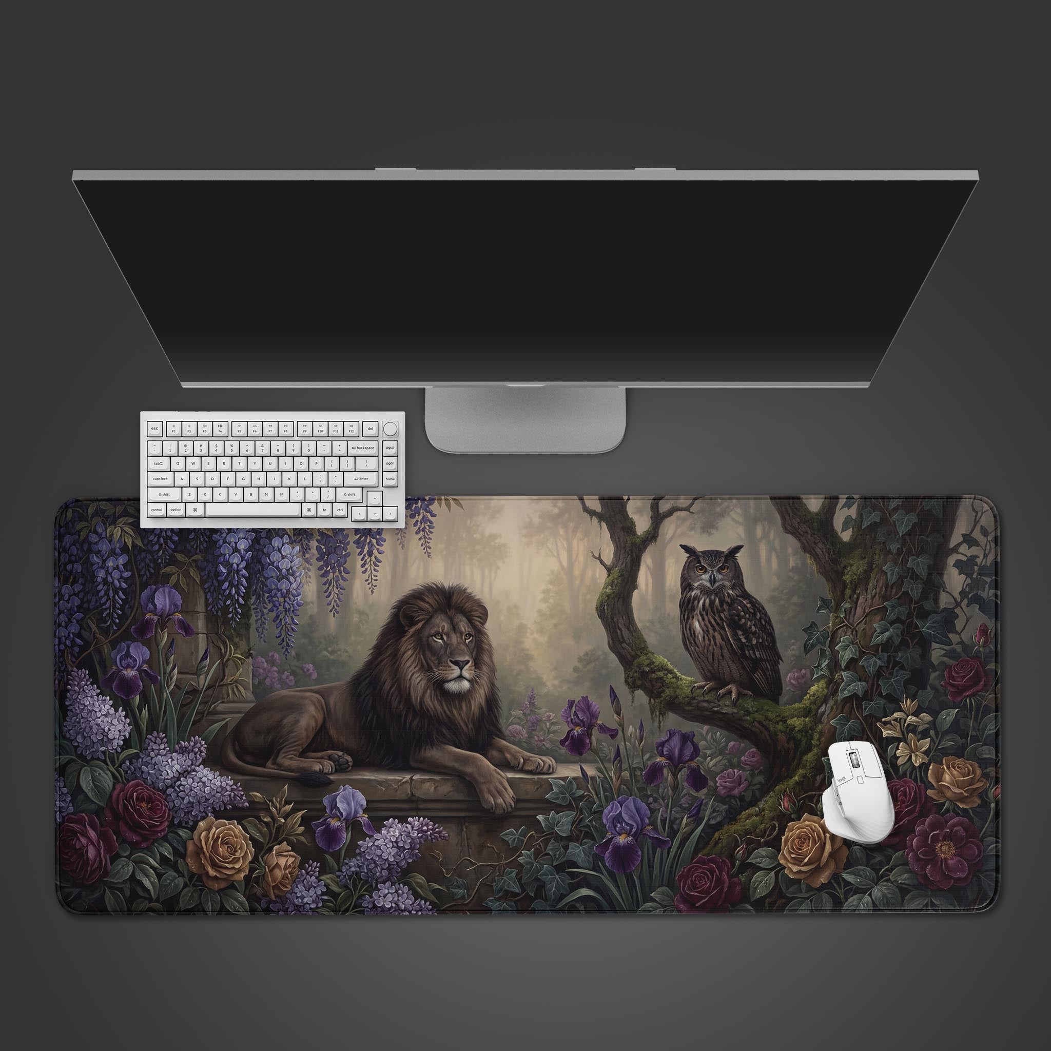 The Mystic Wardens gaming desk mat on a desk with a white keyboard and mouse, showing the detailed lion and owl artwork from a top-down view. - Epic Design Pads & Mousepads