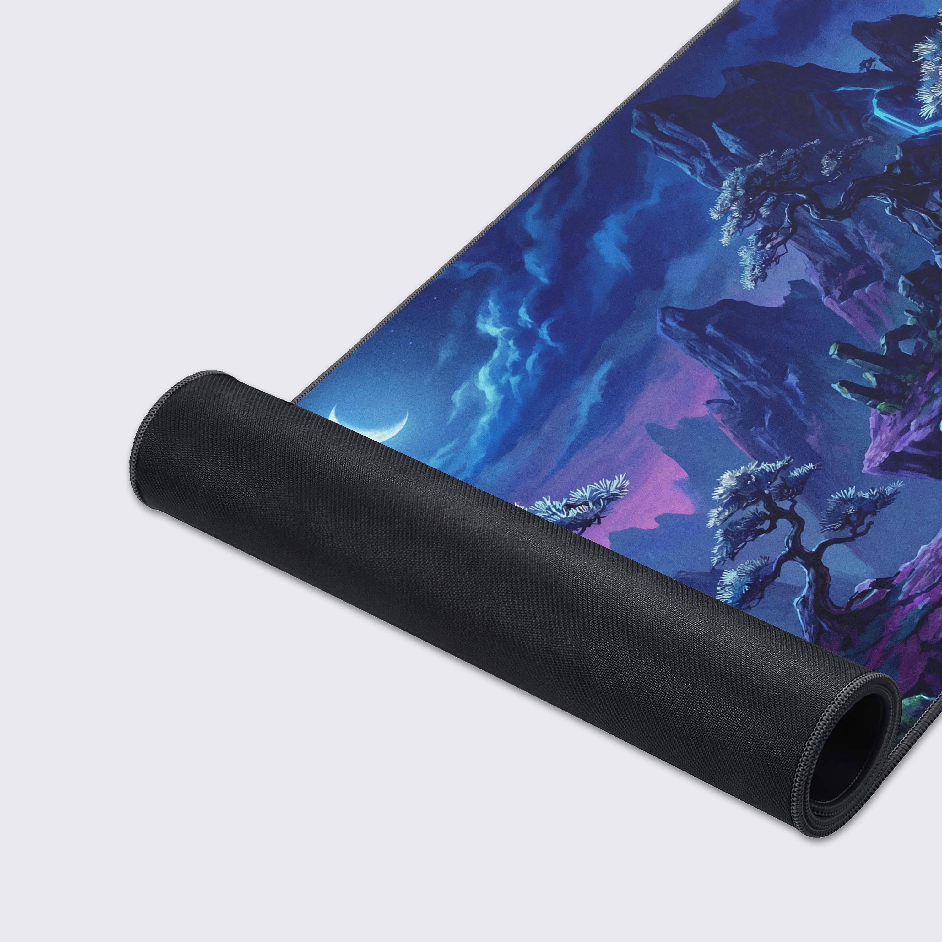 Wide view of the magical night landscape desk mat showing mountains, stone lanterns, and a crescent moon.