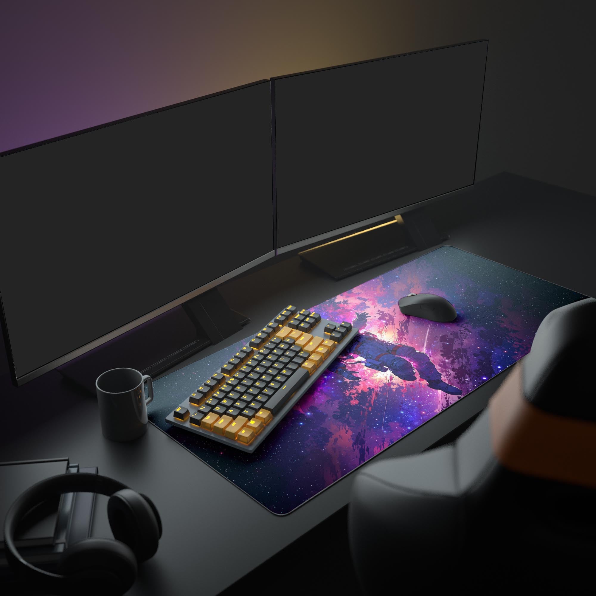 Large Nebula Navigator space desk mat shown in a full gaming setup with dual monitors, mechanical keyboard, and headphones. - Epic Design Pads