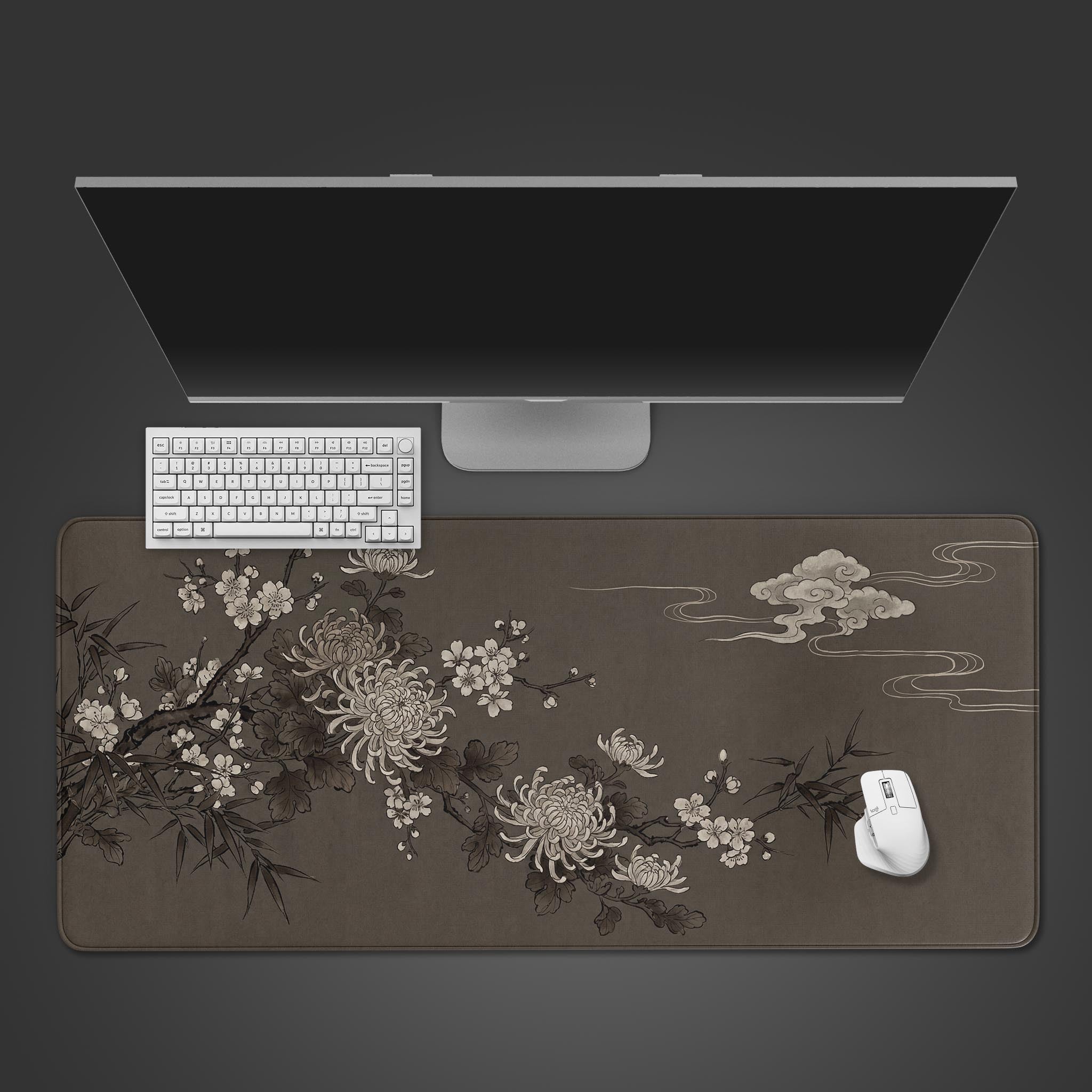 Top-down view of the Night Blossom Japanese floral gaming desk mat, shown with a white keyboard, mouse, and a large monitor on a dark grey background. - Epic Design Pads & Mousepads