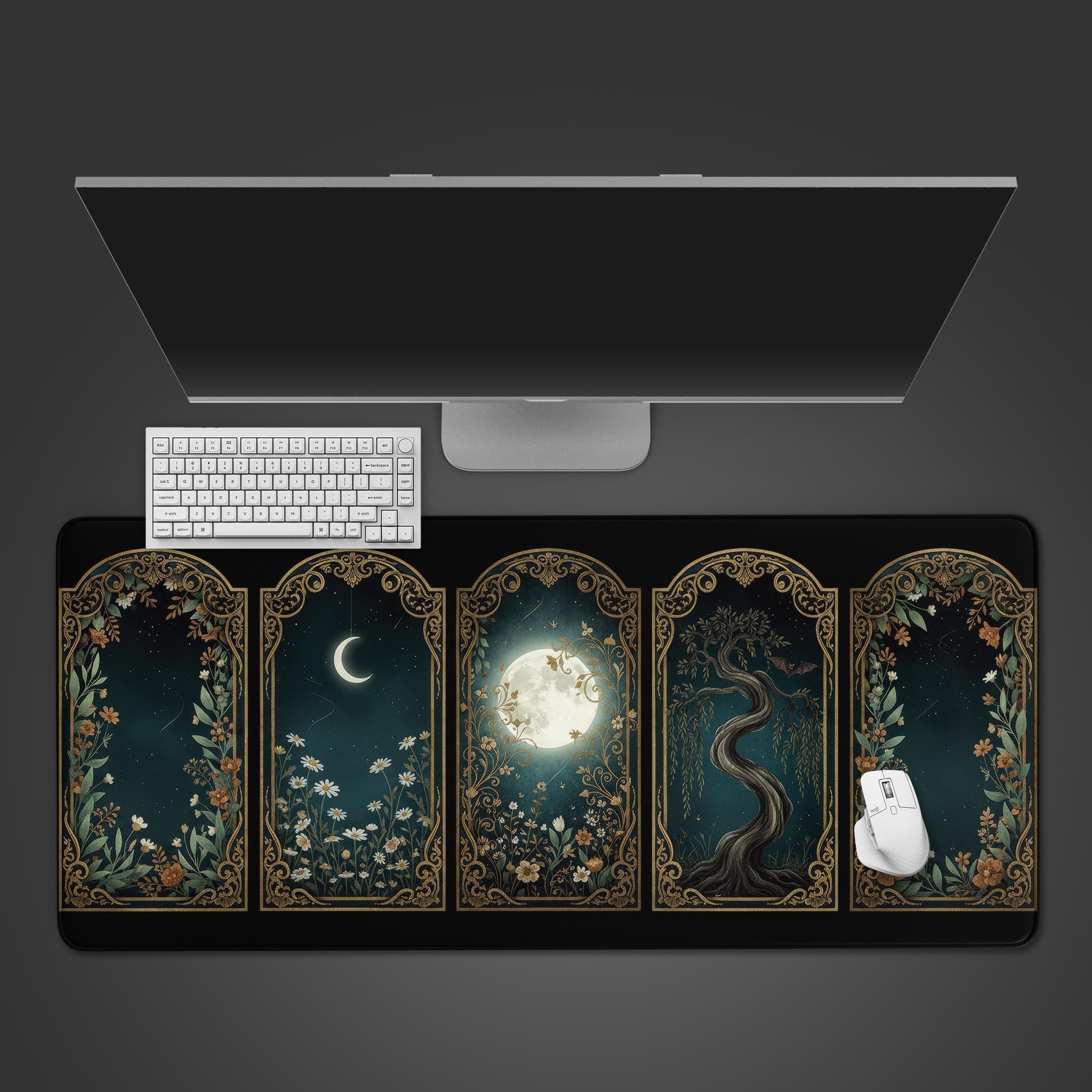 Art Nouveau desk mat with Nocturne Panels celestial moon design, shown on a desk with a keyboard and mouse. - Epic Design Pads
