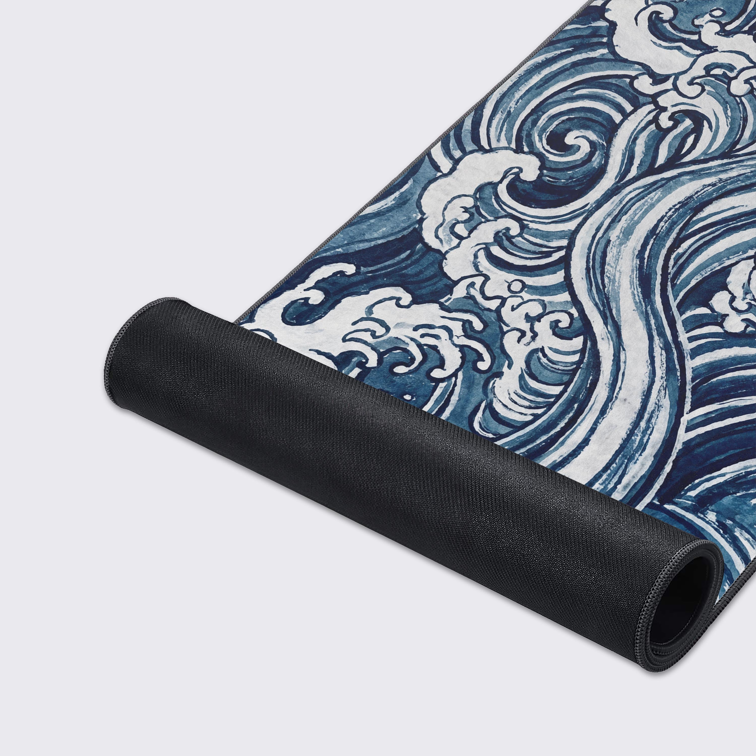Waterproof and easy to clean features of the Indigo Waves desk mat