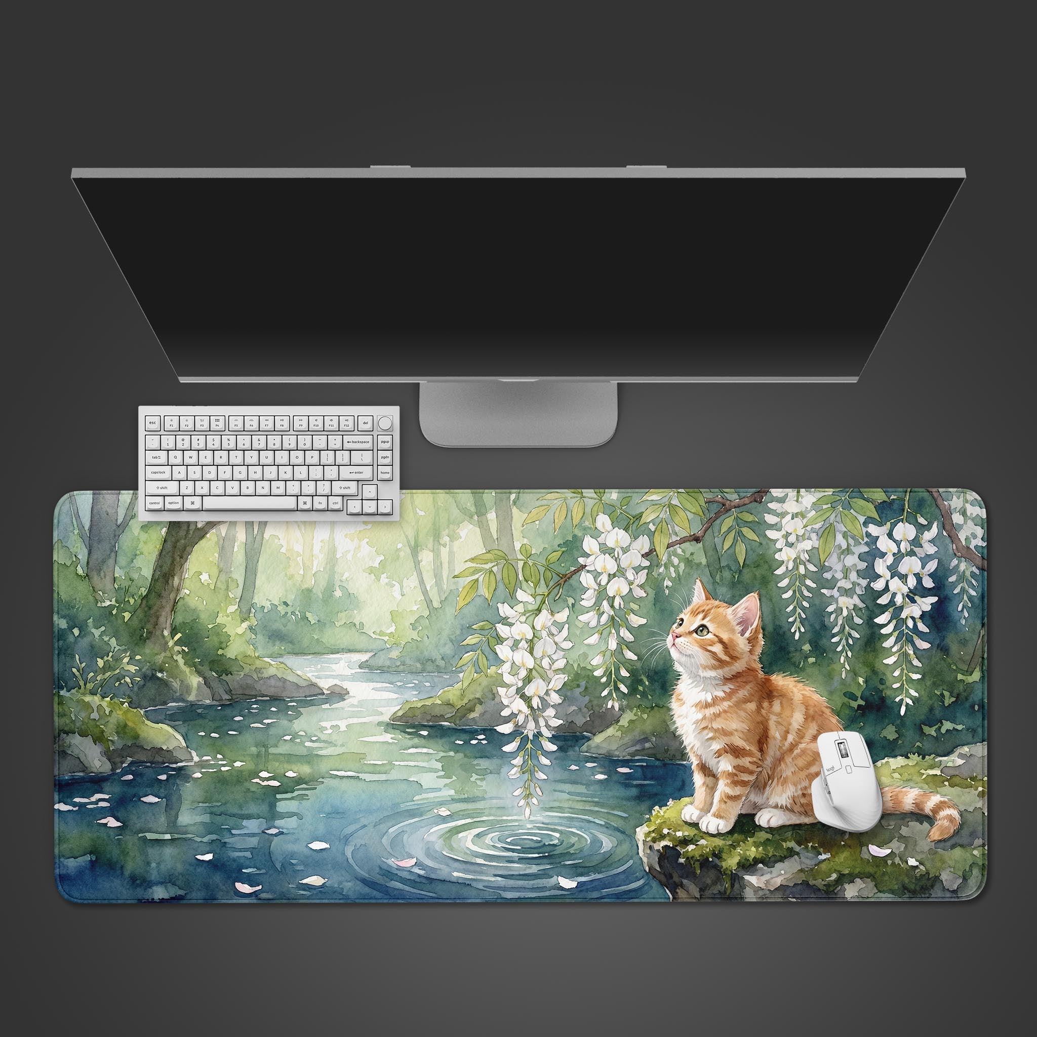 Wisteria Cat desk mat featuring a watercolor orange tabby sitting by a serene river