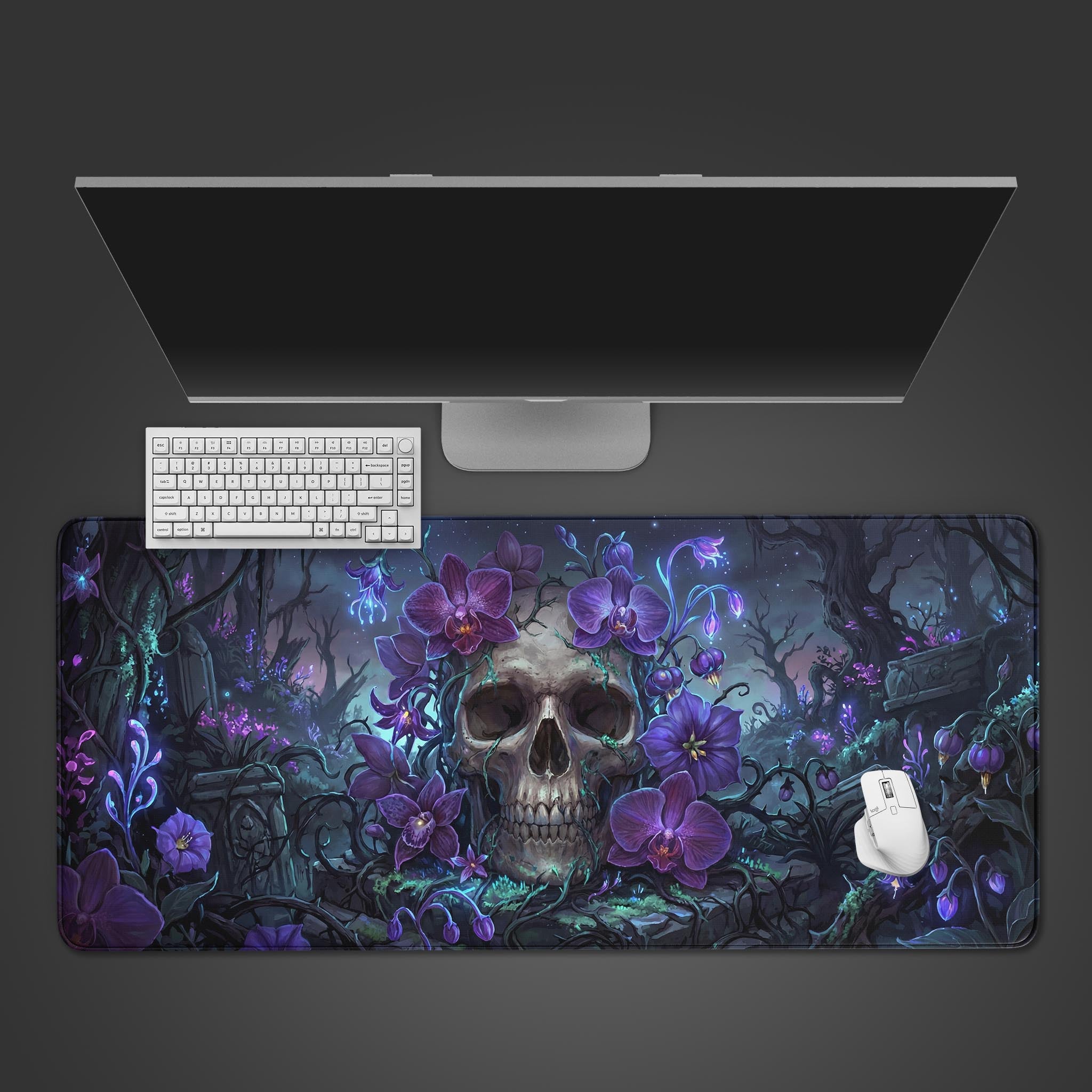 Orchid Skull desk mat with purple flowers and gothic art, shown on a desk with a black keyboard and gaming mouse. - Epic Design Pads & Mousepads