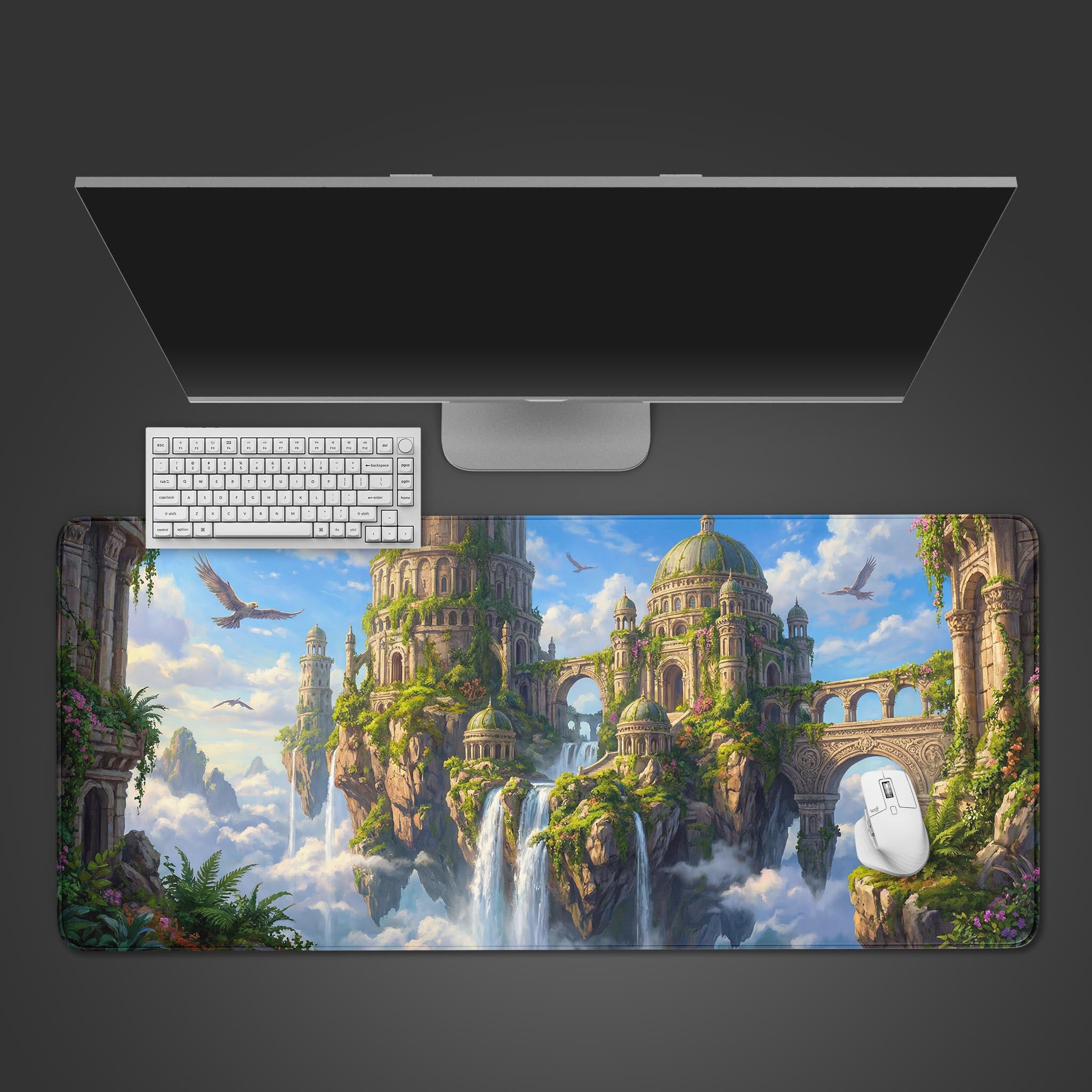 Top-down view of the Overgrown Aether Ruins gaming desk mat, showcasing the fantasy floating castle design with a white keyboard and mouse. - Epic Design Pads & Mousepads