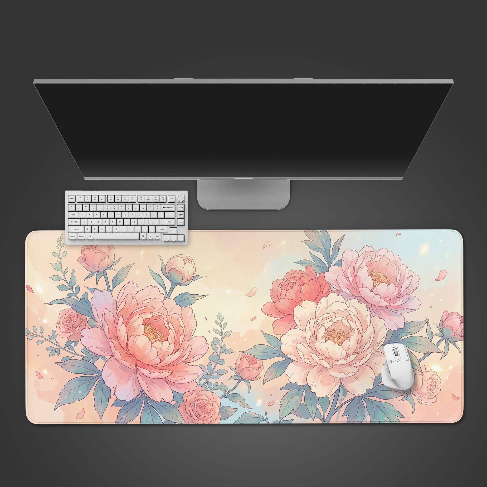 Top-down view of the Pastel Bloom floral gaming desk mat featuring soft pink peonies, shown with a white keyboard and mouse on a dark surface. - Epic Design Pads & Mousepads