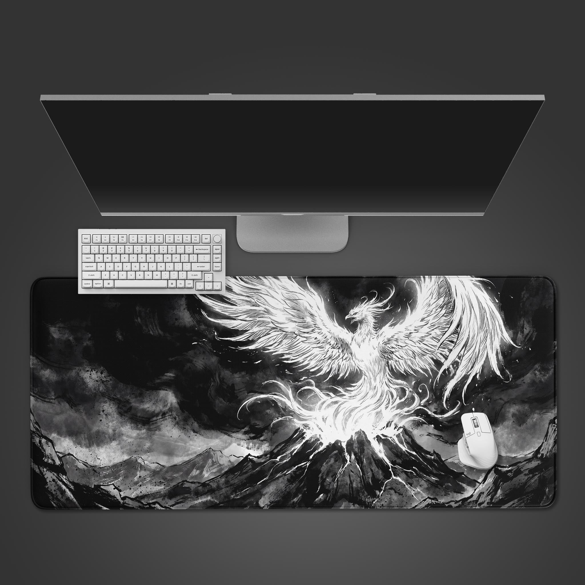 Epic monochrome Ascending Phoenix desk mat featuring an ink-wash style mythical bird erupting from a mountain.