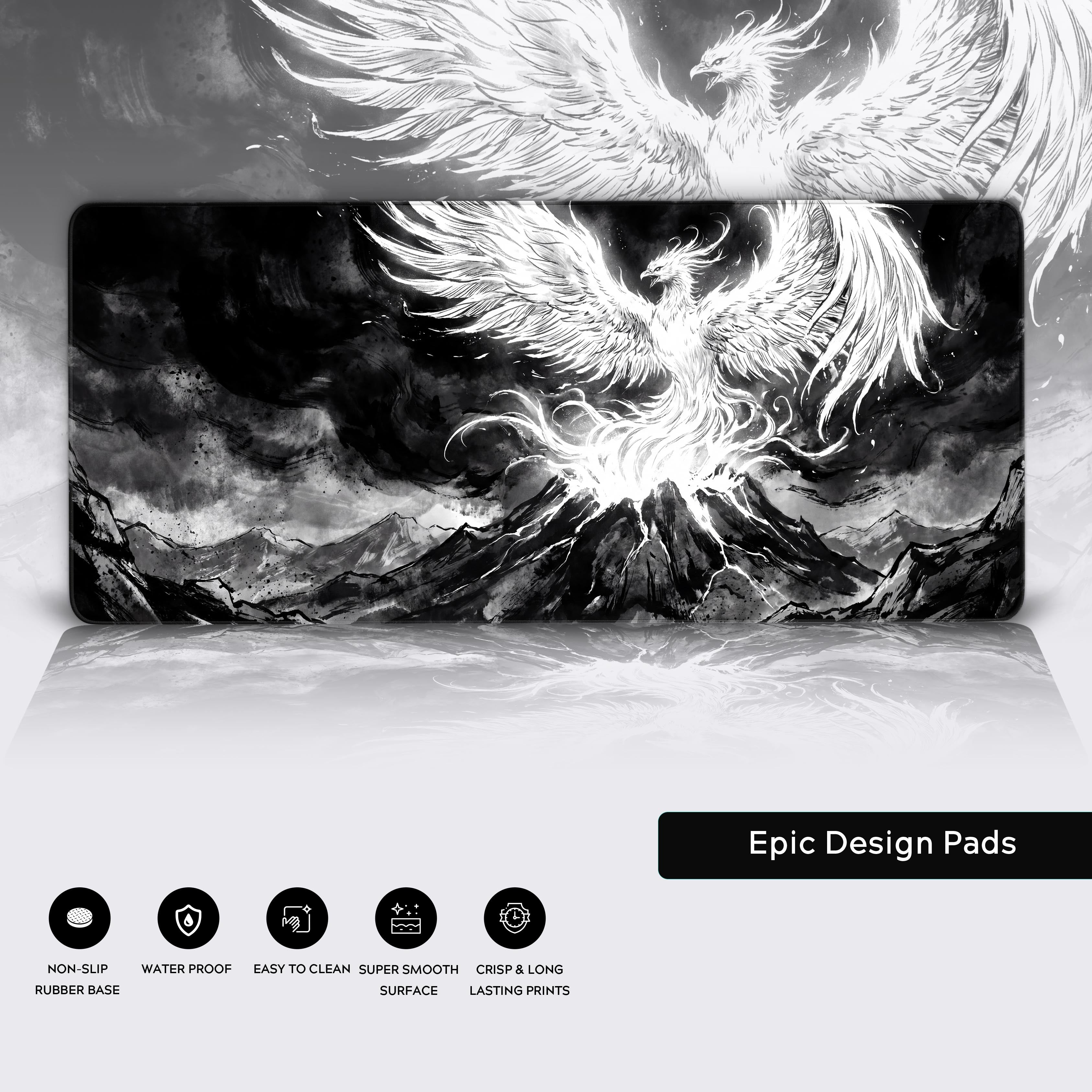 Wide view of the large black and white fantasy phoenix desk mat lying flat with a subtle reflection.