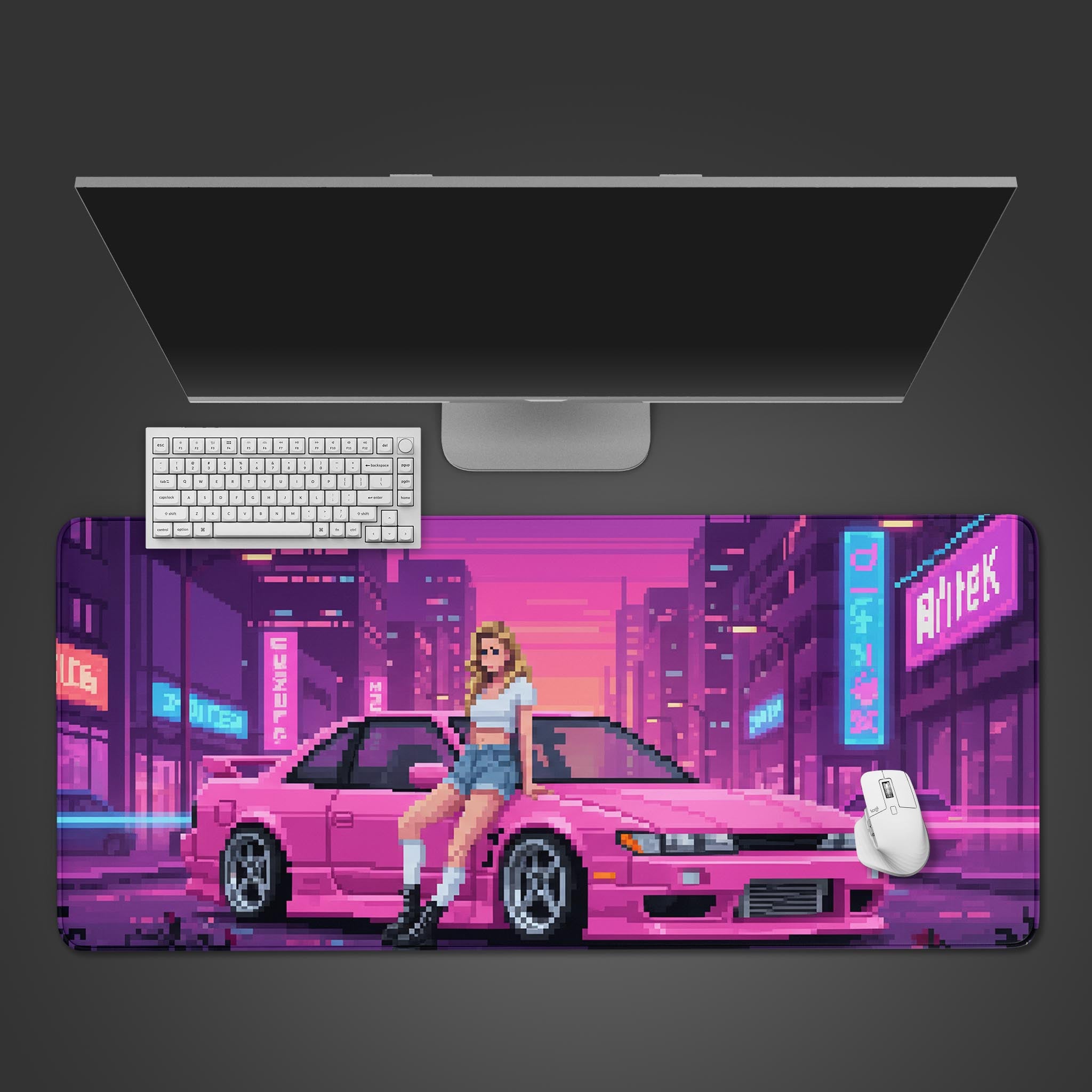 Pixel Drift pixel art gaming desk mat with pink sports car and cyberpunk city – top-down desktop view with a keyboard and mouse. - Epic Design Pads