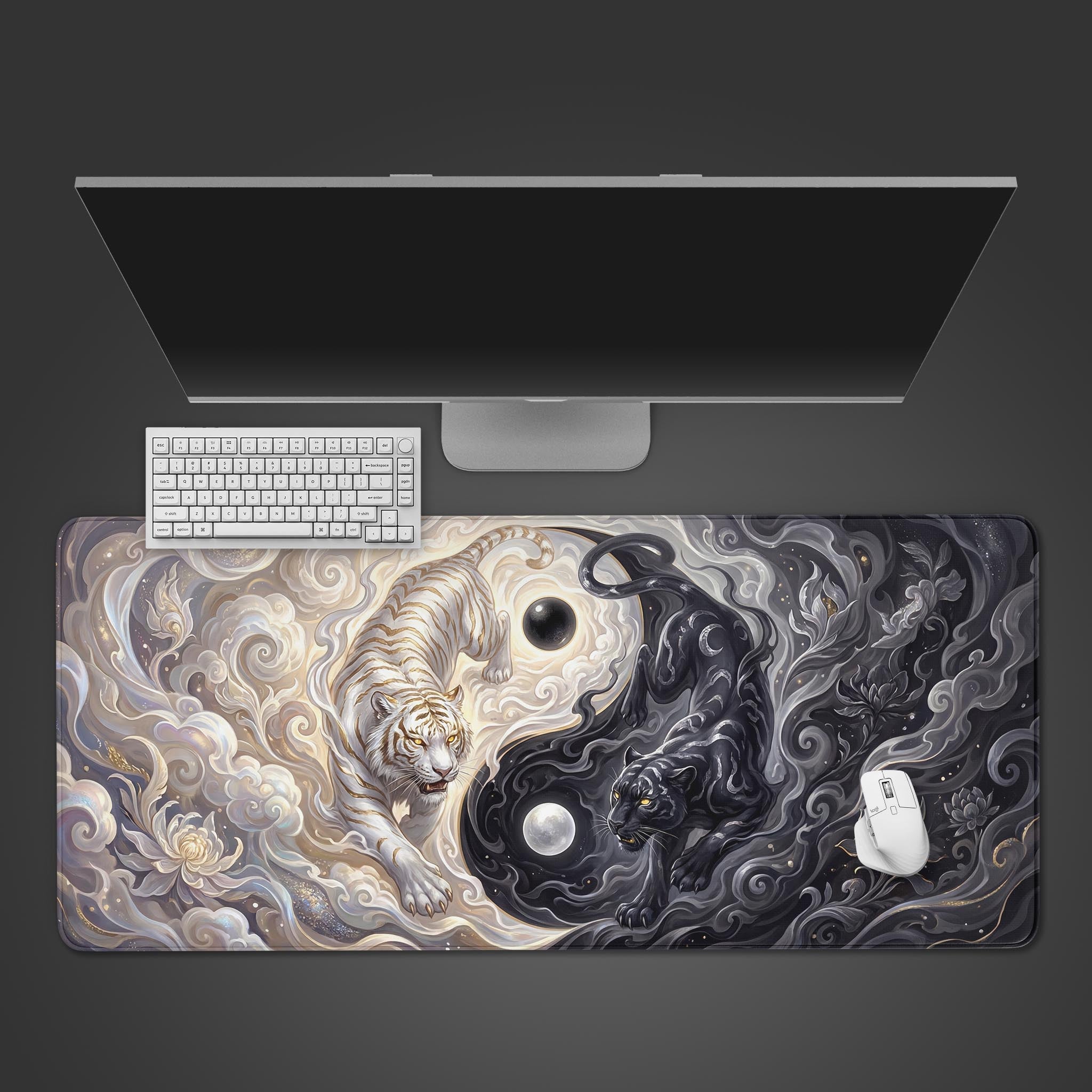 A top-down view of the Primal Yin Yang Gaming Desk Mat, showing the white tiger and black panther design with a white keyboard and mouse on a dark surface. - Epic Design Pads & Mousepads