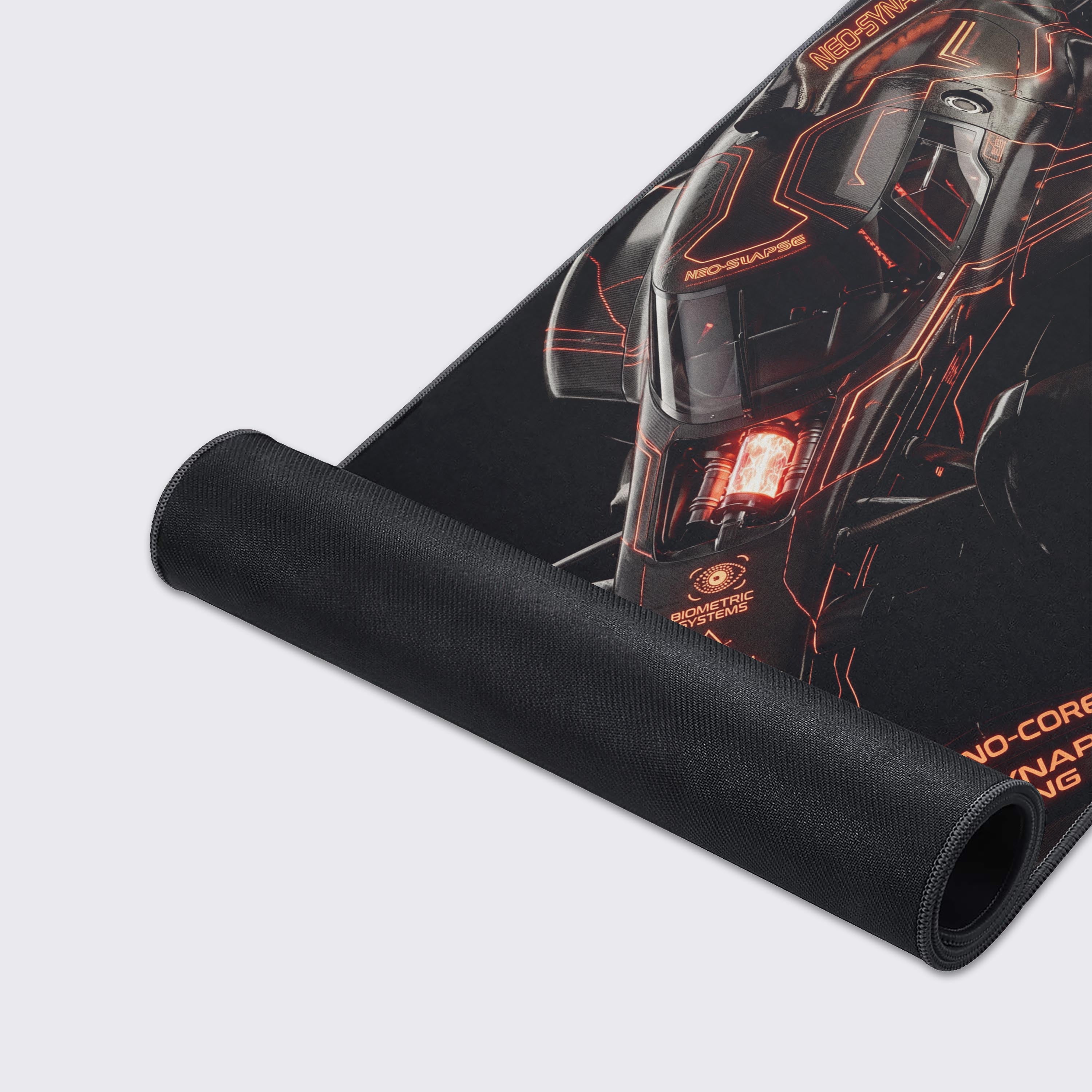 High-tech carbon fiber racing vehicle desk mat floating on a clean background