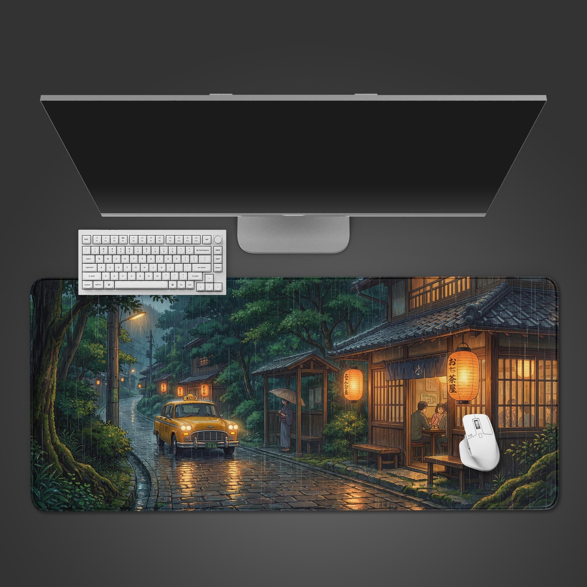 Top-down view of the Rainy Taxi Japan gaming desk mat on a desk with a sleek monitor, white keyboard, and mouse. - Epic Design Pads & Mousepads