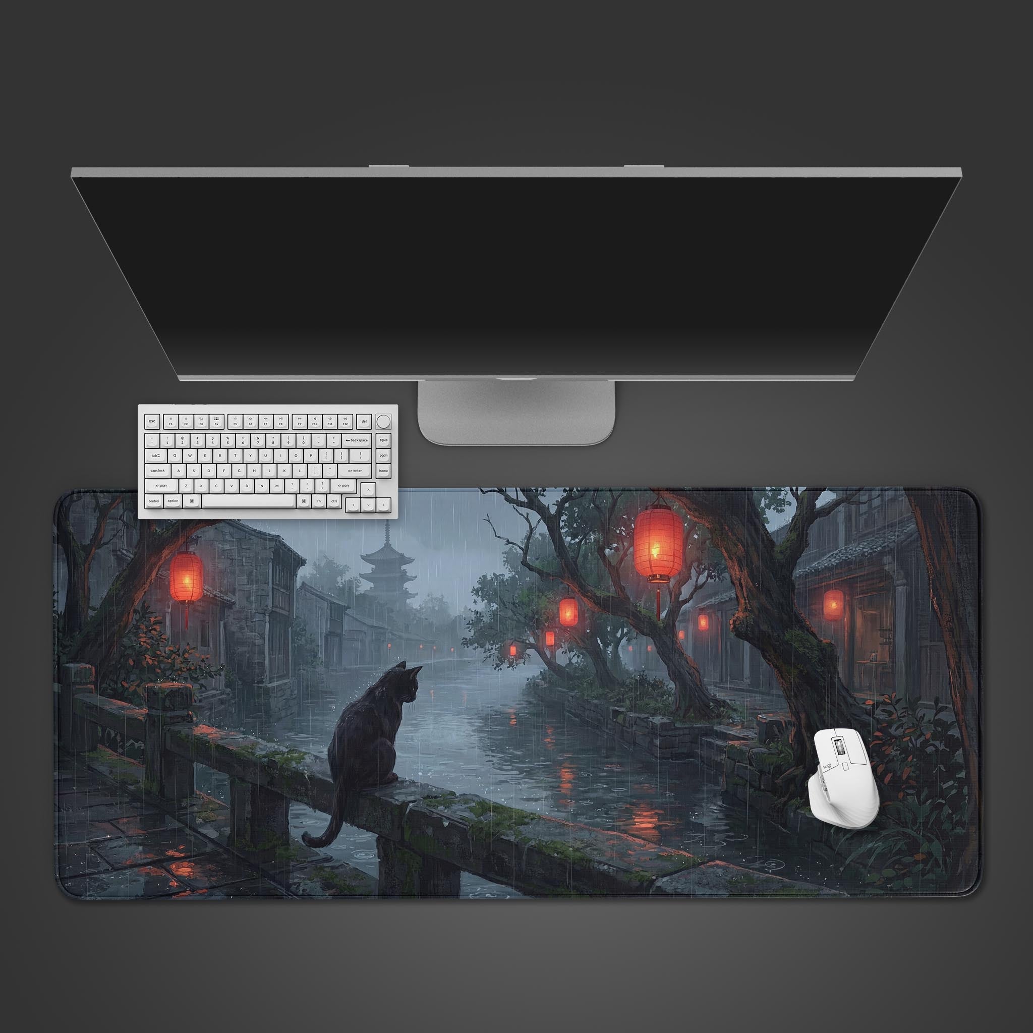 Top-down view of the Rainy Watcher gaming desk mat, featuring a Japanese rainy town scene with a black cat, shown with a white keyboard and mouse on a dark surface. - Epic Design Pads & Mousepads