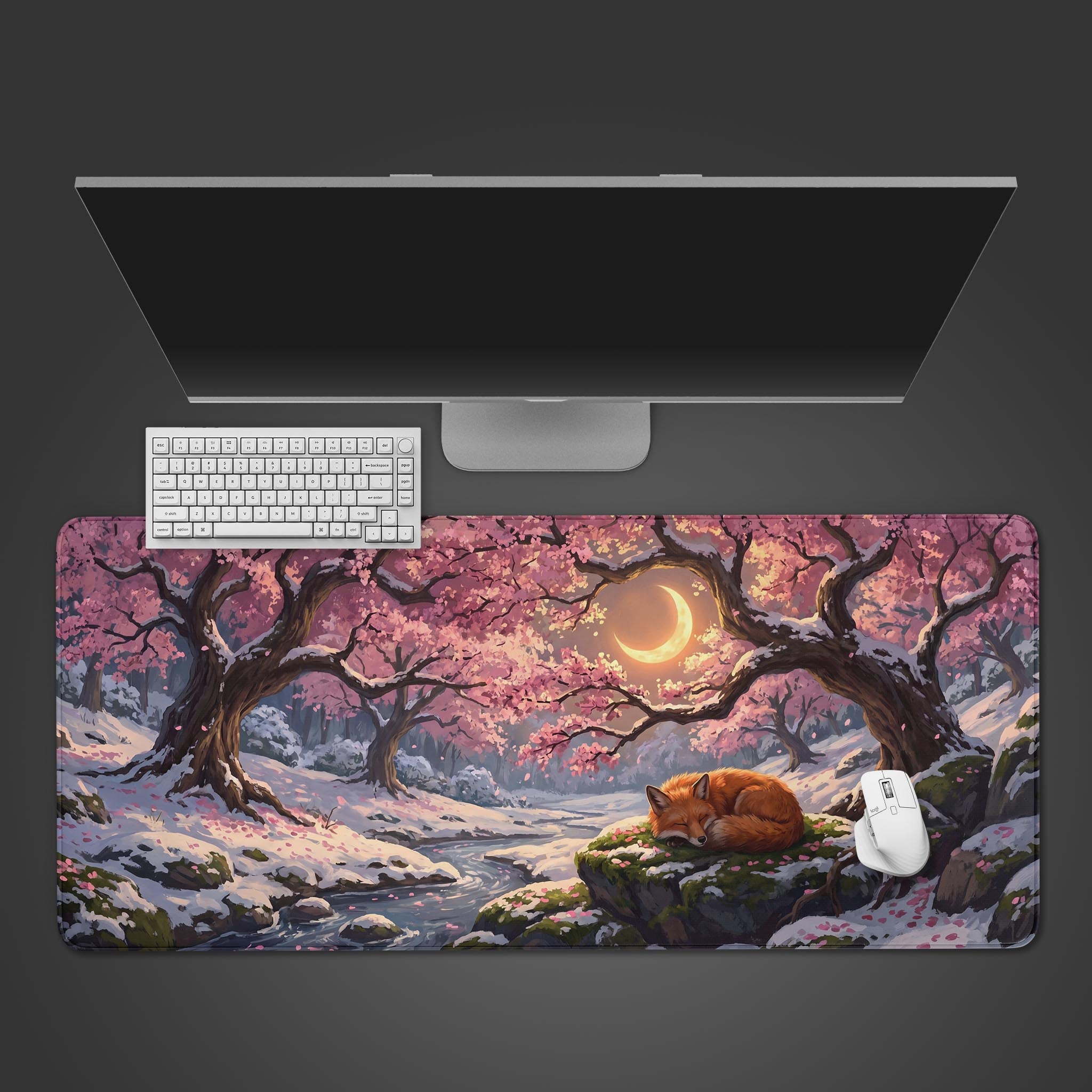 Winter Blossom Fox desk mat featuring a sleeping red fox under snowy cherry blossom trees