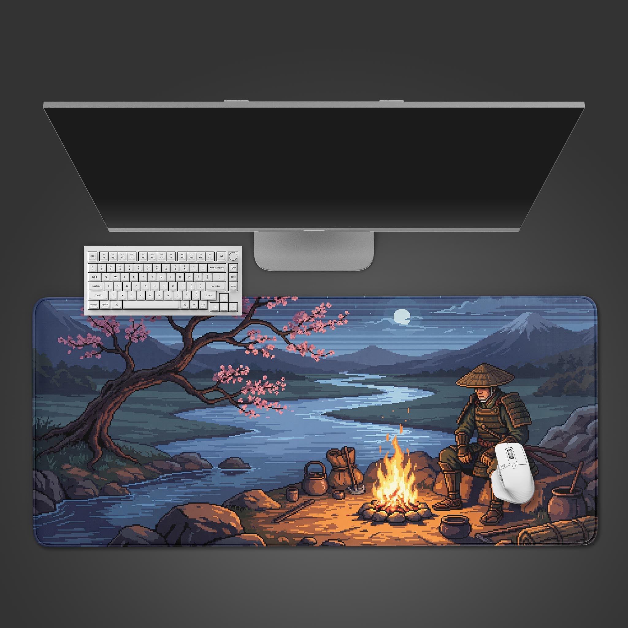 The Ronin's Respite pixel art gaming desk mat shown from above, with a white keyboard and mouse, creating a serene Japanese-themed workspace. - Epic Design Pads & Mousepads