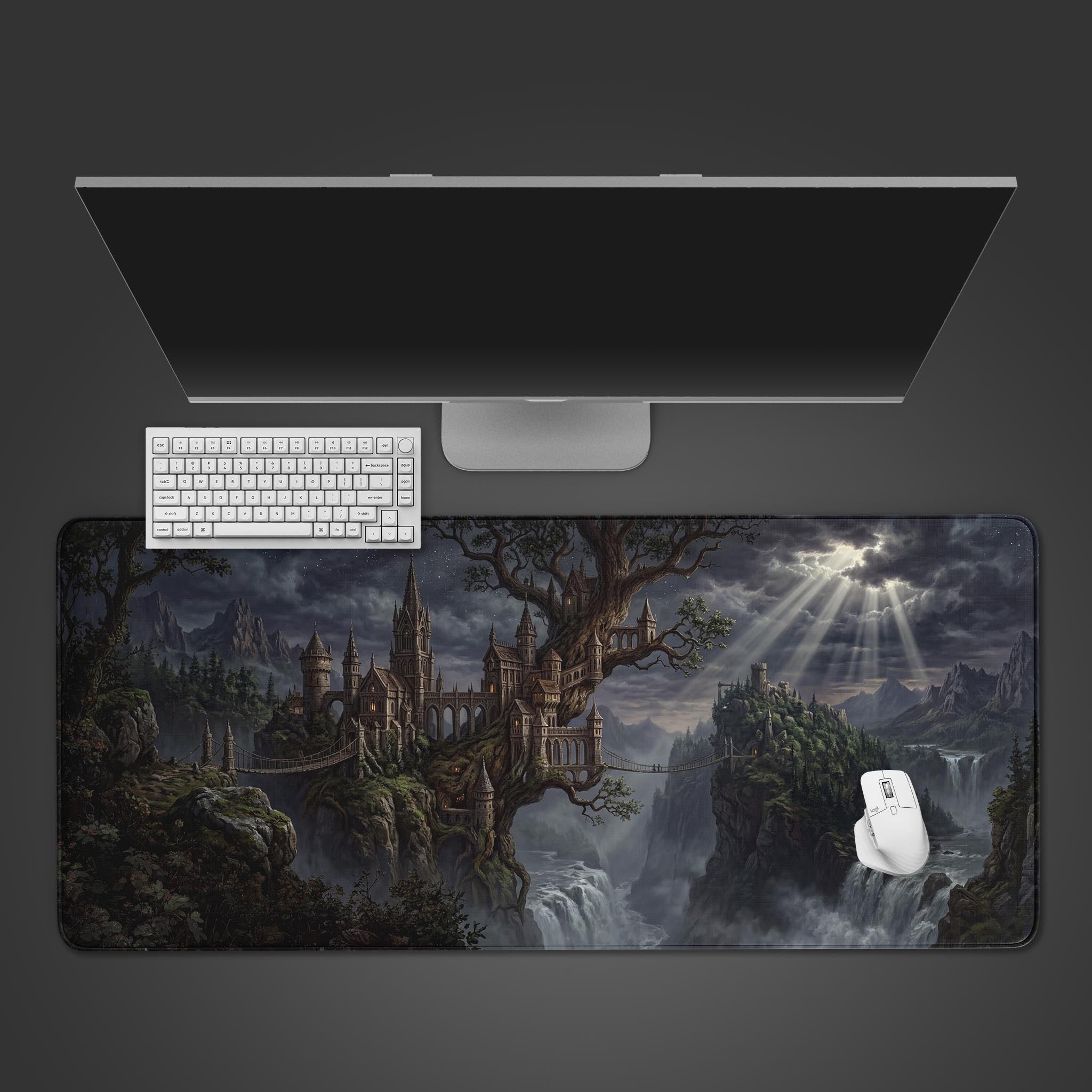 Top-down view of the Roots of Ruin gaming desk mat, featuring a dark fantasy castle, shown with a white keyboard and mouse on a grey background. - Epic Design Pads & Mousepads
