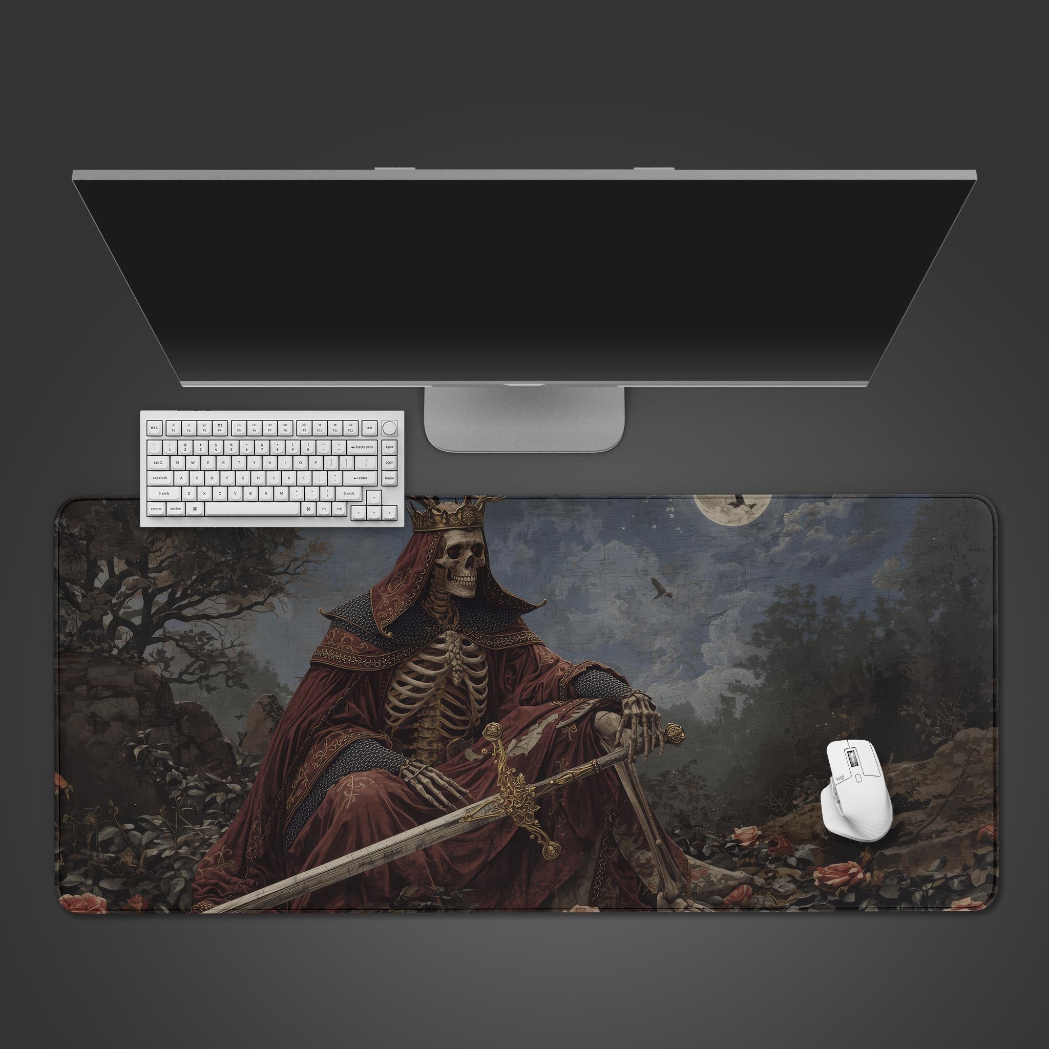 Rose King dark fantasy desk mat with skeleton monarch design – top-down view on a desk with a gaming keyboard and mouse. - Epic Design Pads
