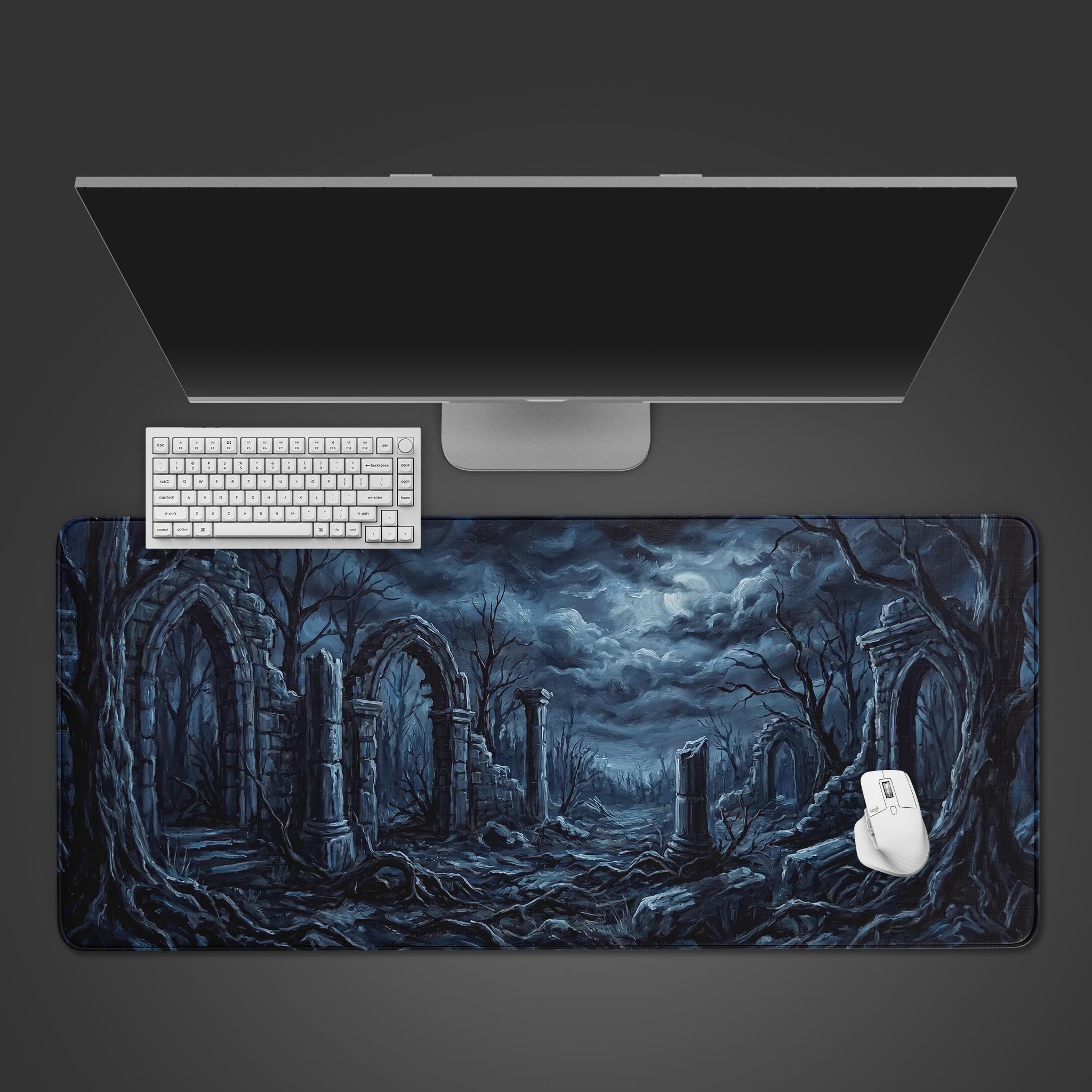 Dark fantasy desk mat featuring moonlit ancient ruins and desolate woods