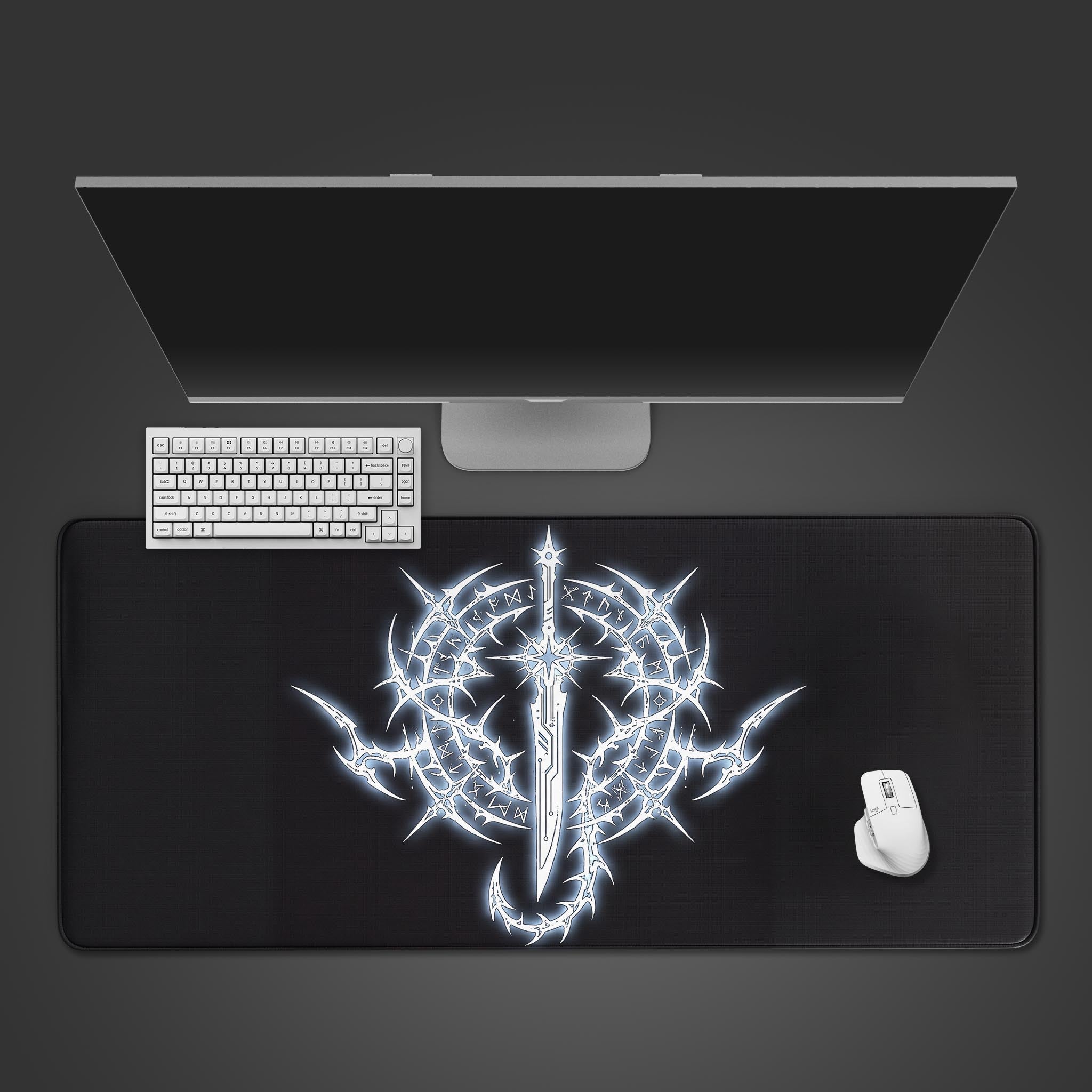 Top-down view of the Rune Blade gaming desk mat, showcasing its glowing mystical sword design alongside a white keyboard and mouse on a dark surface. - Epic Design Pads & Mousepads