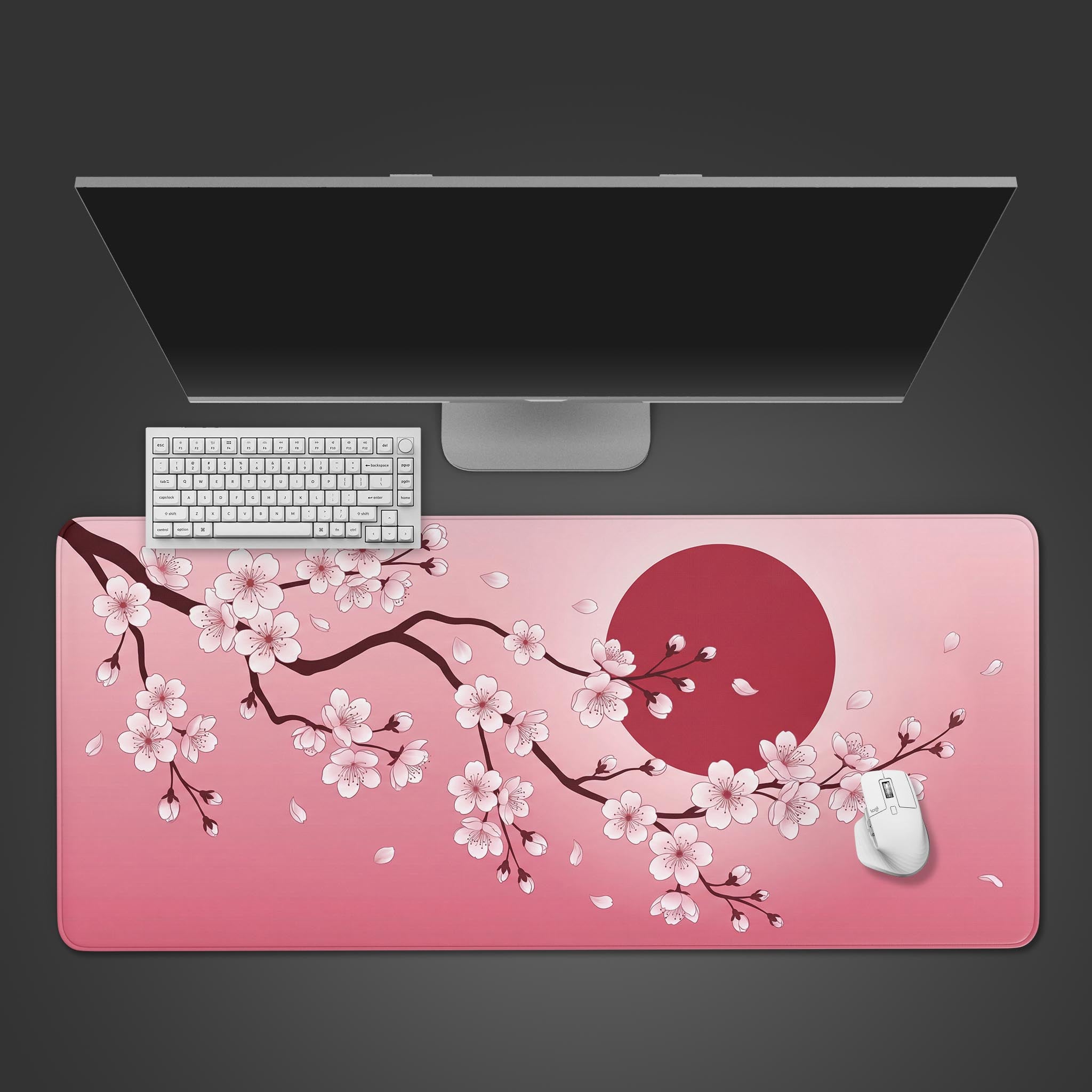 Top-down view of the Sakura Dawn Gaming Desk Mat. A white keyboard and mouse are neatly arranged on the pink cherry blossom and red sun design. - Epic Design Pads & Mousepads