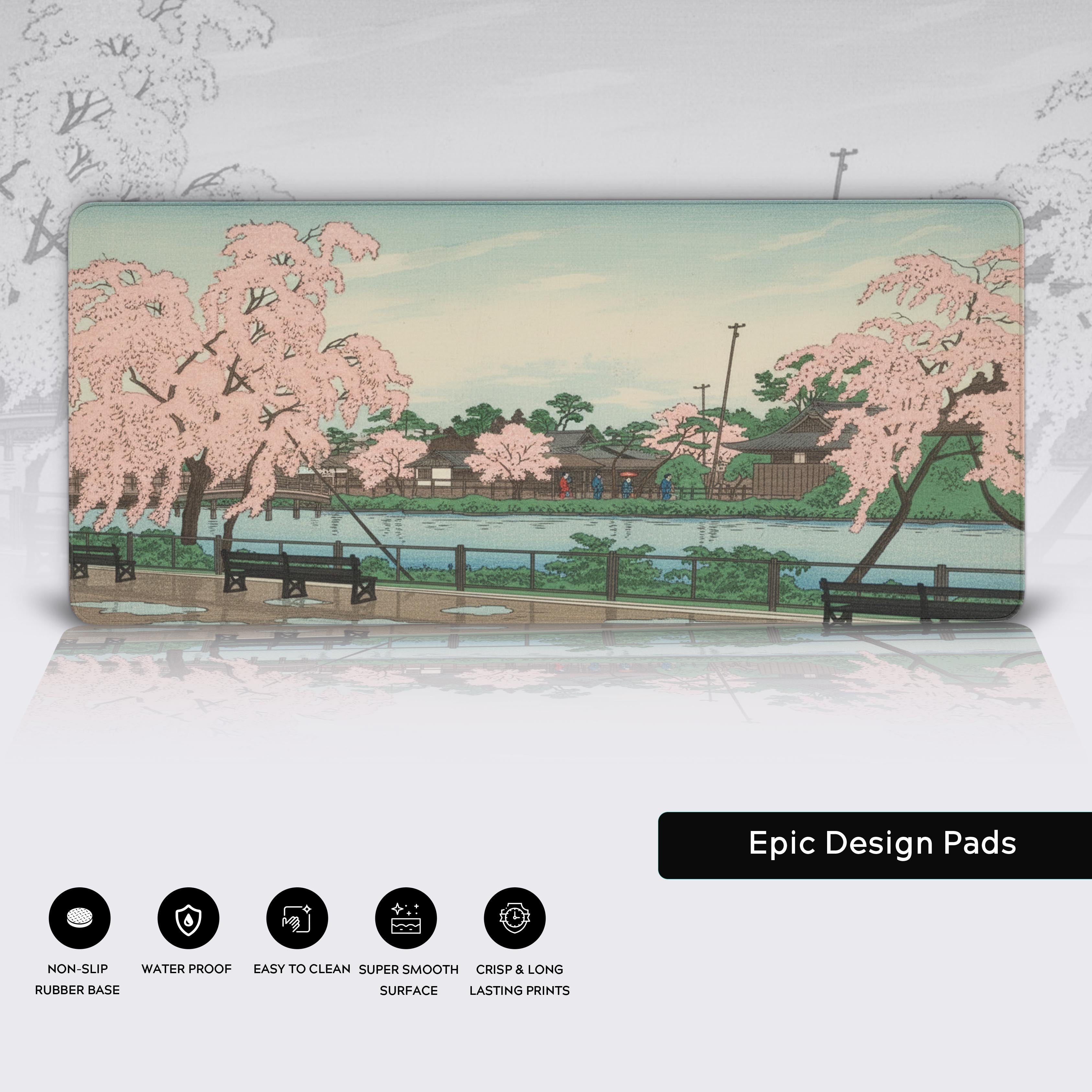 Close-up of the Sakura Season Japanese desk mat showing the detailed cherry blossom art, stitched edges, and non-slip rubber base. - Epic Design Pads