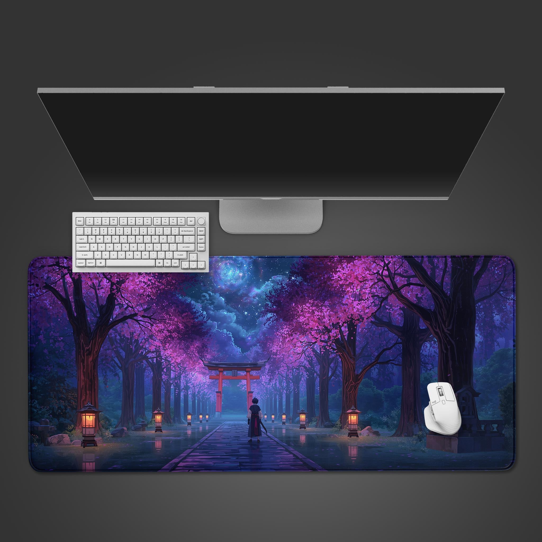 Sakura Shrine Path anime desk mat on a desk with a keyboard and mouse, showing the moonlit torii gate and glowing cherry blossoms. - Epic Design Pads