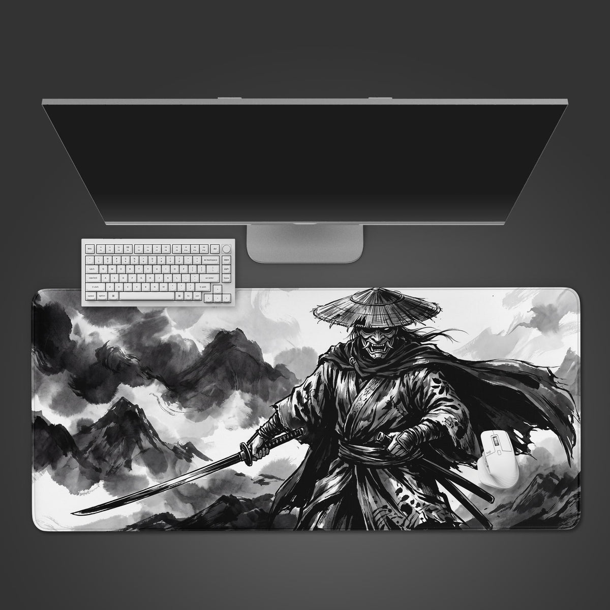 A desk mat featuring a traditional black and white ink wash painting of a samurai wielding a katana.