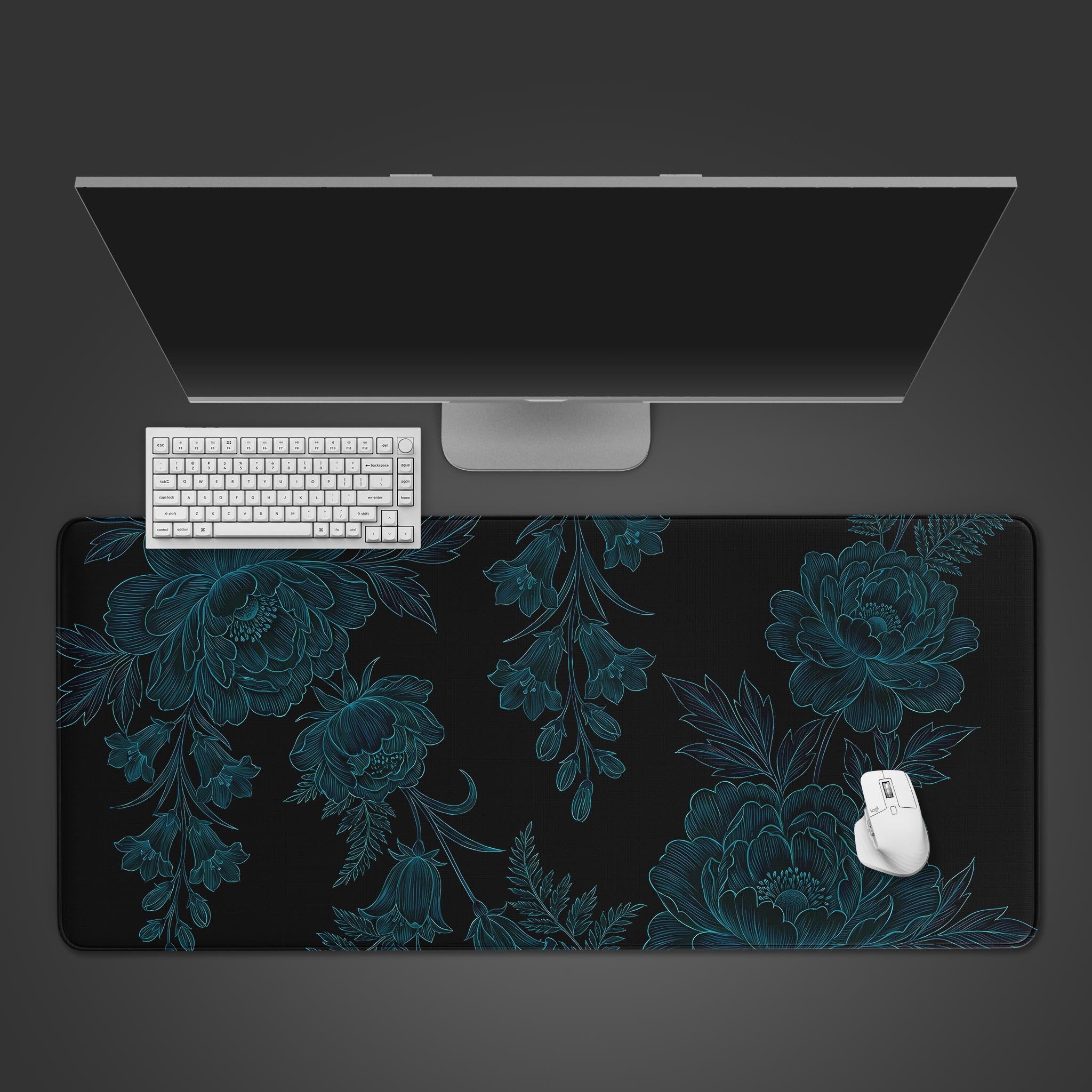 Top-down view of the Shadow Bloom gaming desk mat featuring a teal floral line art design, shown with a white keyboard and mouse on a dark background. - Epic Design Pads & Mousepads