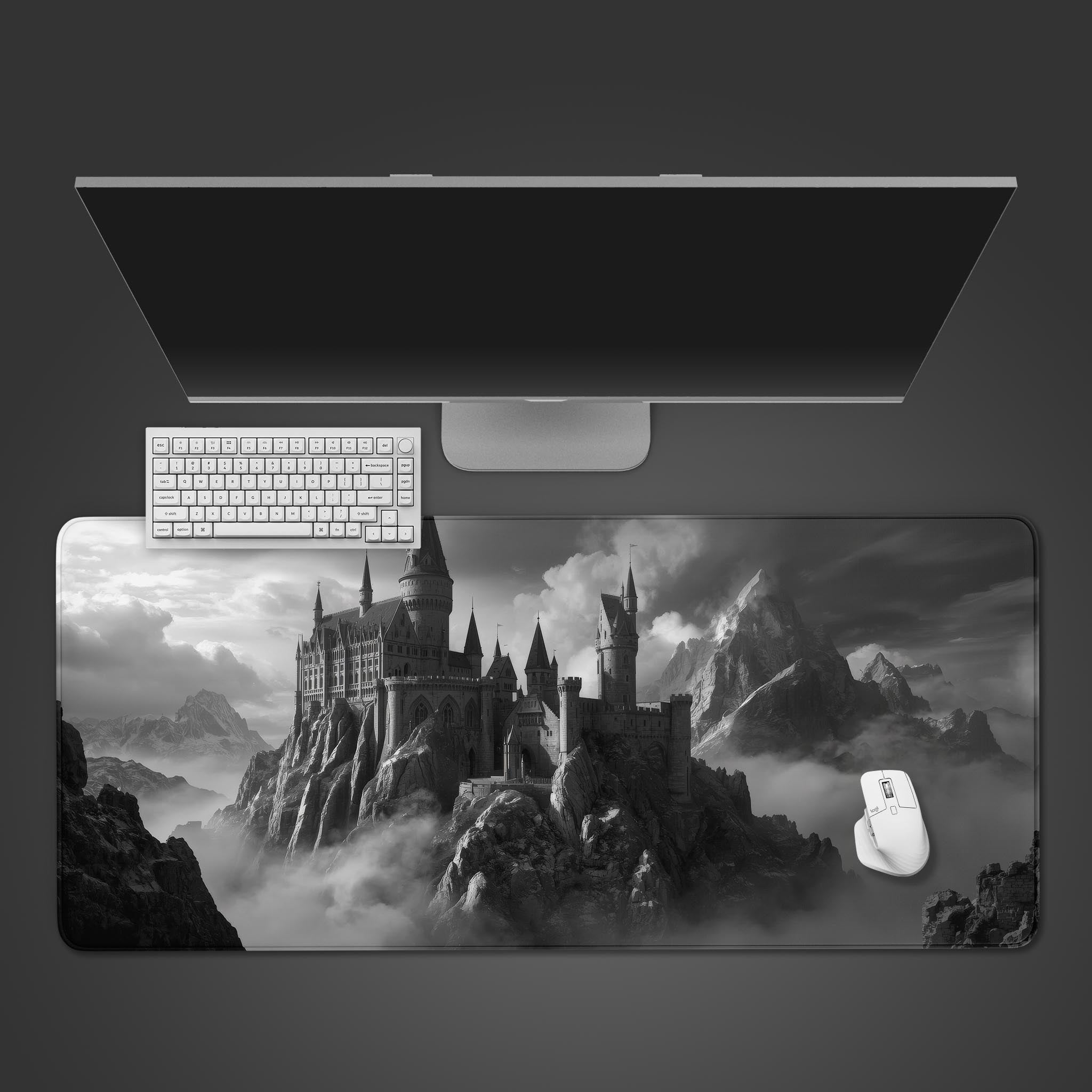 Shadow Spire gaming desk mat with gothic castle design in black and white. Top-down view on a desk with a mechanical keyboard and gaming mouse. - Epic Design Pads
