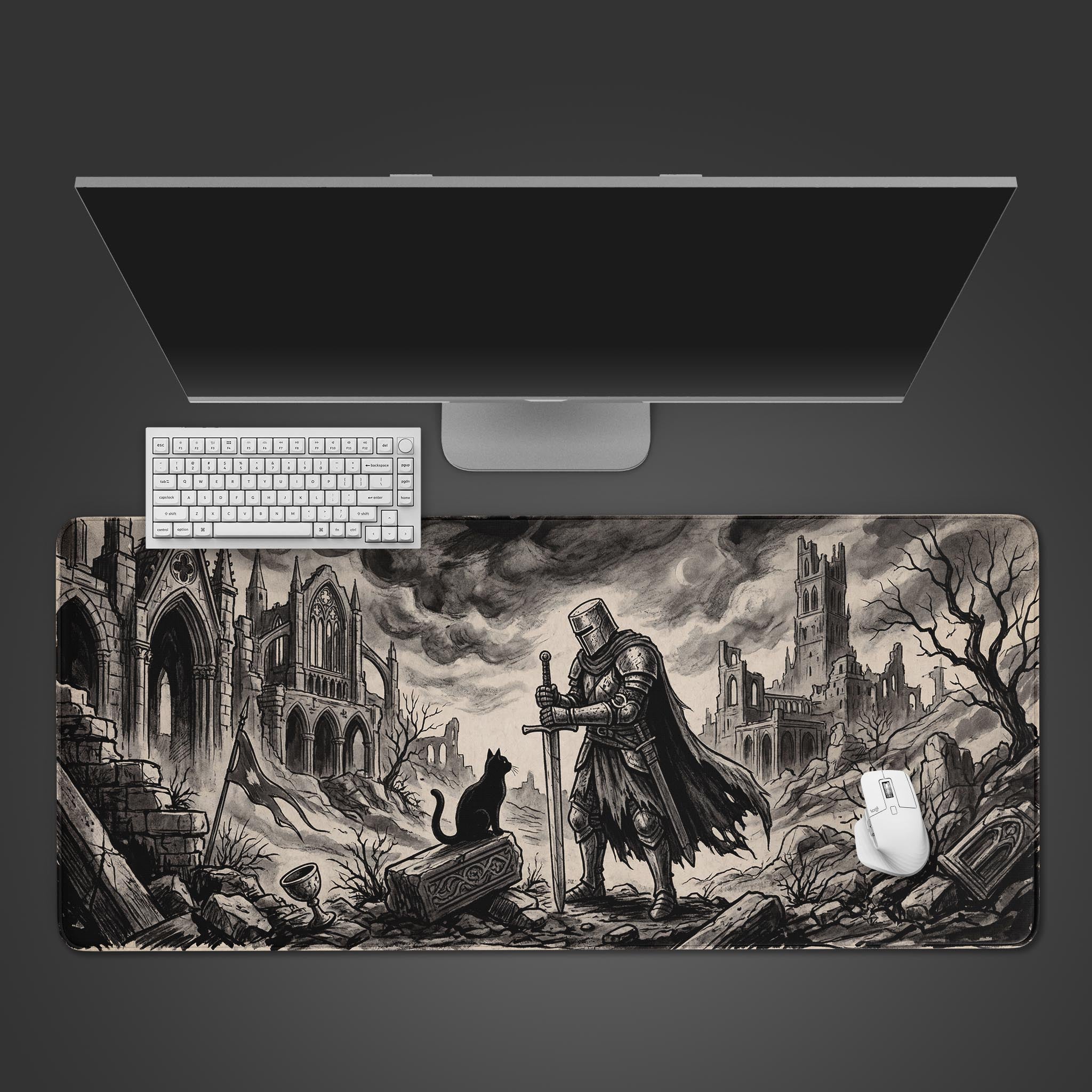 The Silent Companion Gaming Desk Mat, shown top-down with a white keyboard, features a monochrome illustration of a knight and cat in gothic ruins. - Epic Design Pads & Mousepads