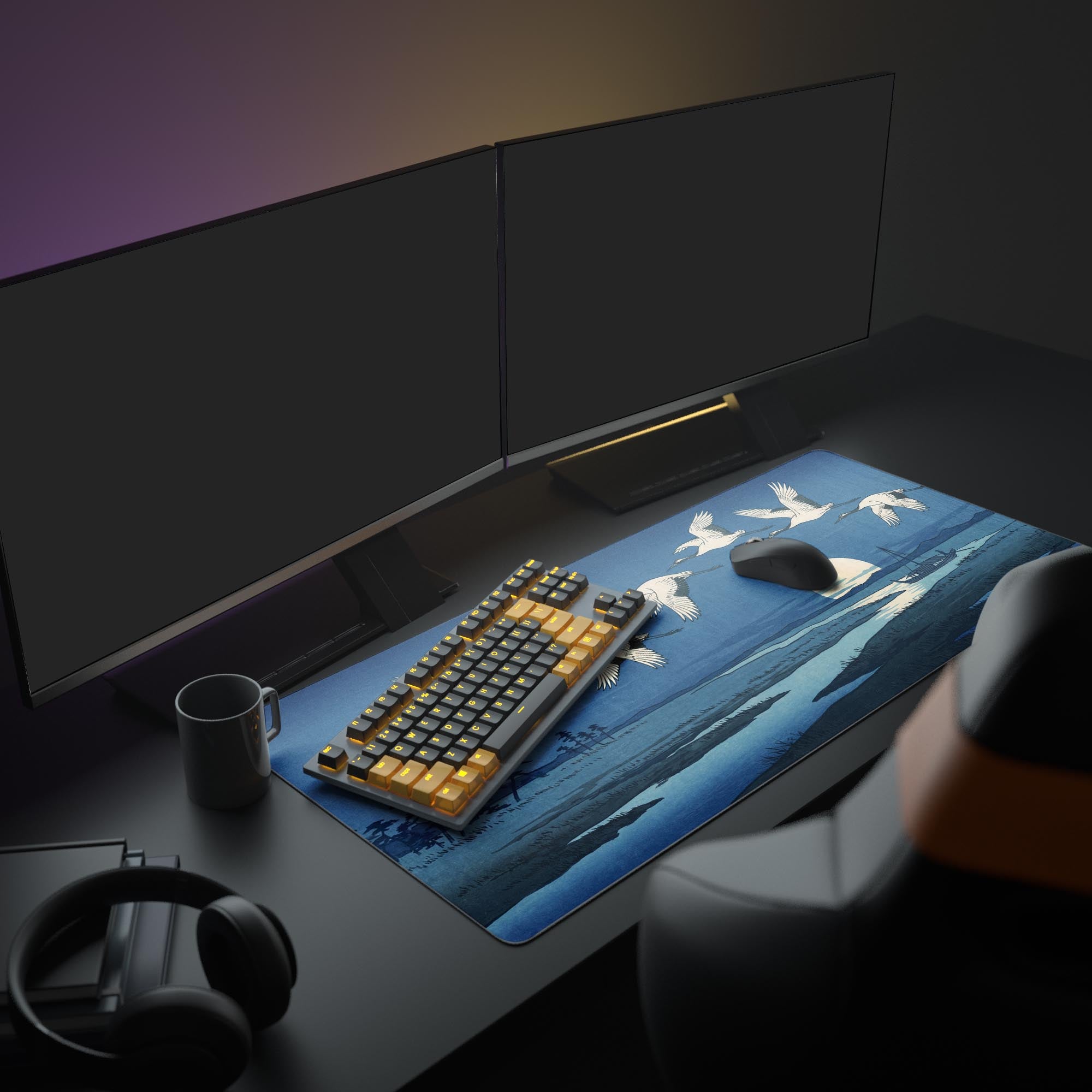 A full PC setup featuring the blue Silent Migration mouse pad with its Ukiyo-e crane art. The mat sits under a monitor, keyboard, and mouse, enhancing the overall desk aesthetic. - Epic Design Pads & Mousepads