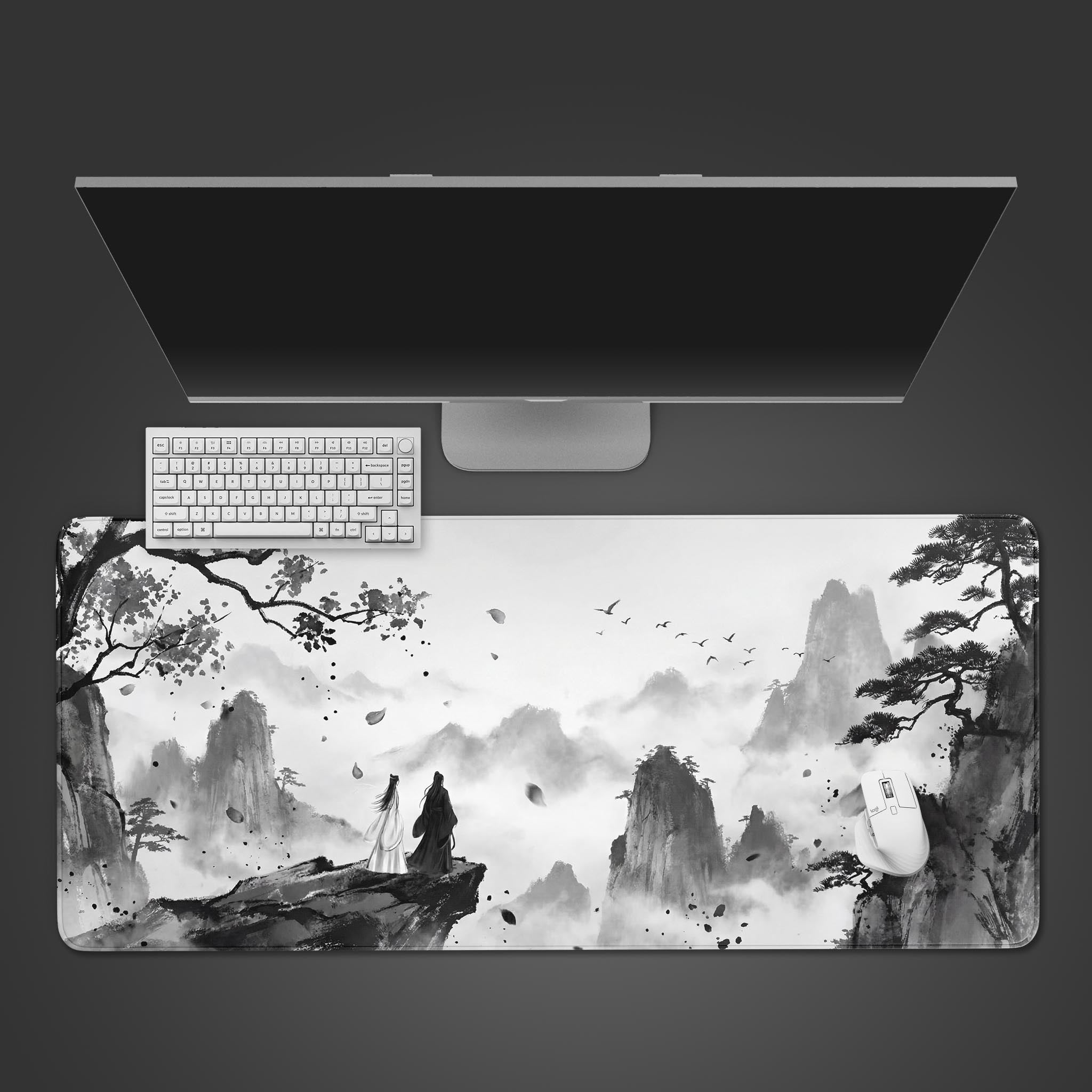 Top-down view of the Silent Observers gaming desk mat, showing the Chinese ink wash mountain design beneath a white keyboard and monitor. - Epic Design Pads & Mousepads