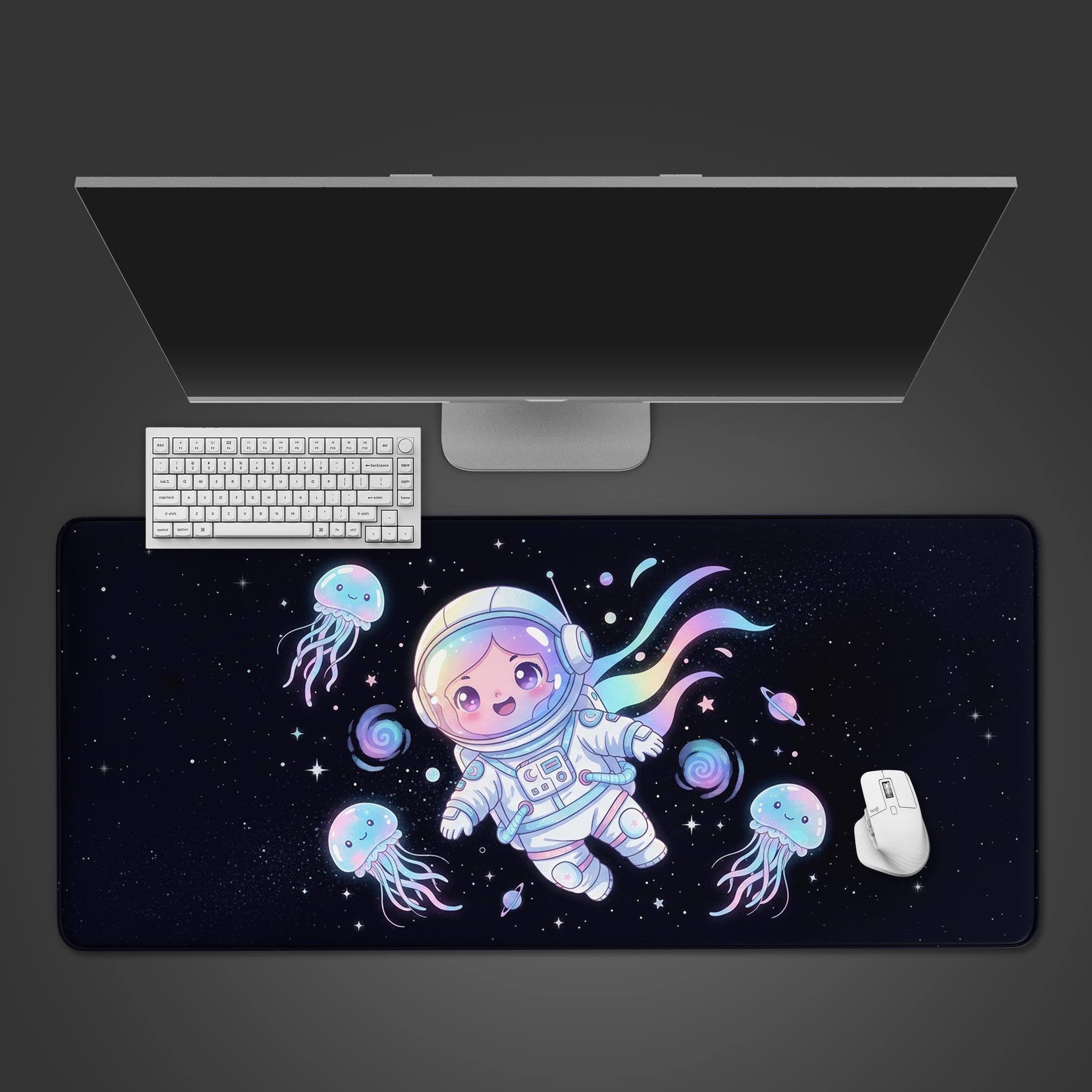 Space Dream desk mat with cute astronaut and jellyfish design, shown from a top-down view with a white keyboard and mouse on a desk. - Epic Design Pads