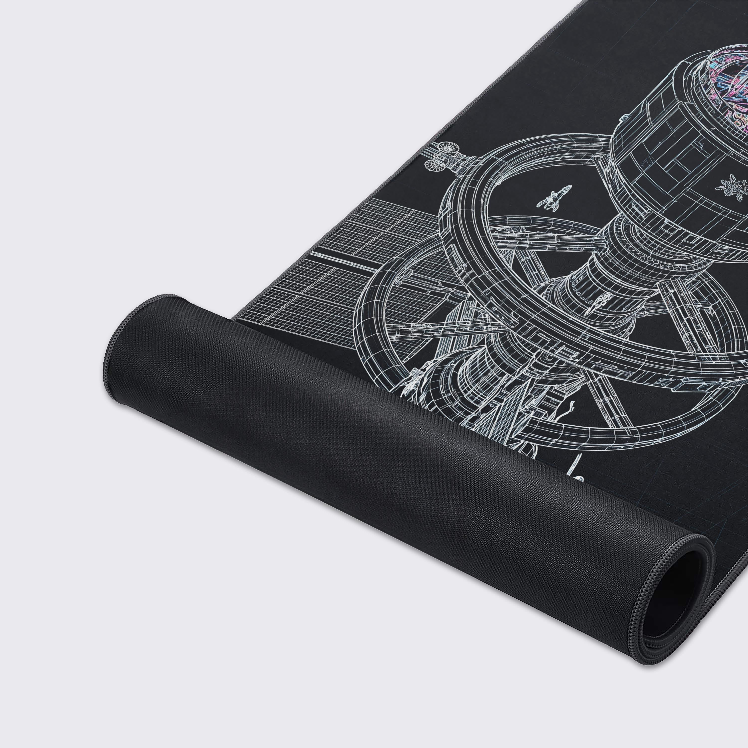 Flat lay view of the wireframe space station gaming mouse pad showcasing its large surface area.