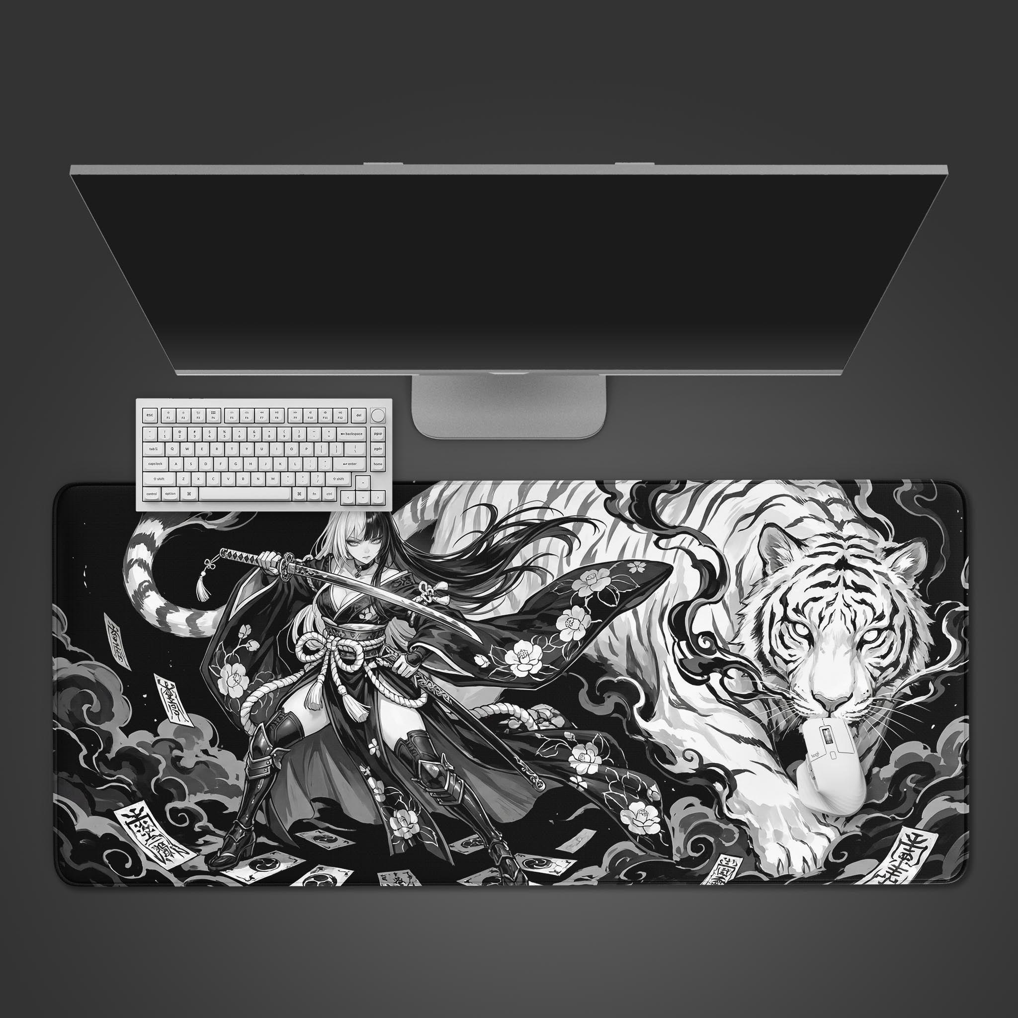 A top-down view of the Spirit Blade gaming desk mat, featuring a monochrome anime warrior and tiger design, with a white keyboard and mouse placed on top. - Epic Design Pads & Mousepads
