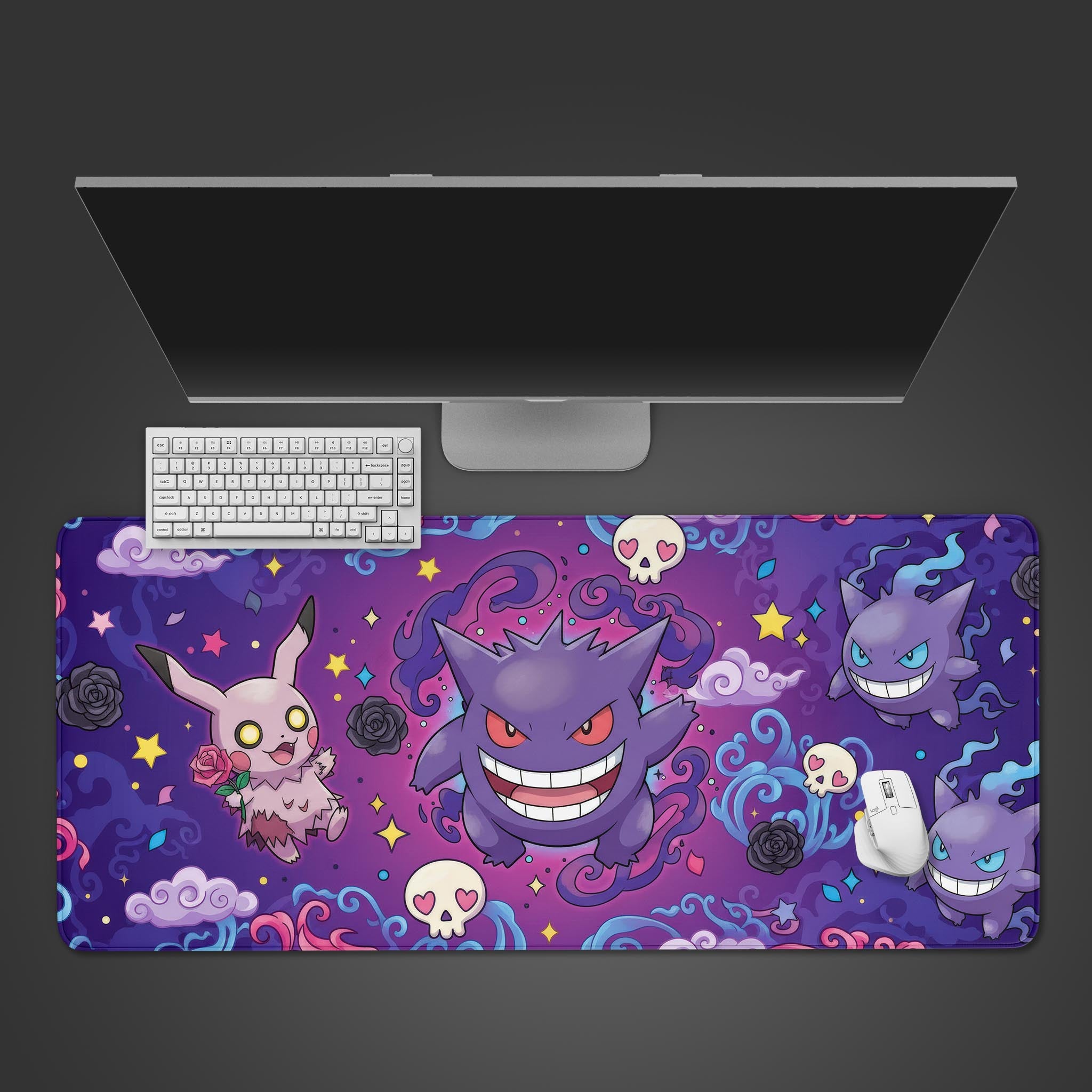 Spooky Squad Ghost Pokemon desk mat with Gengar and Mimikyu in a cosmic design, shown on a desk with a keyboard and mouse. - Epic Design Pads