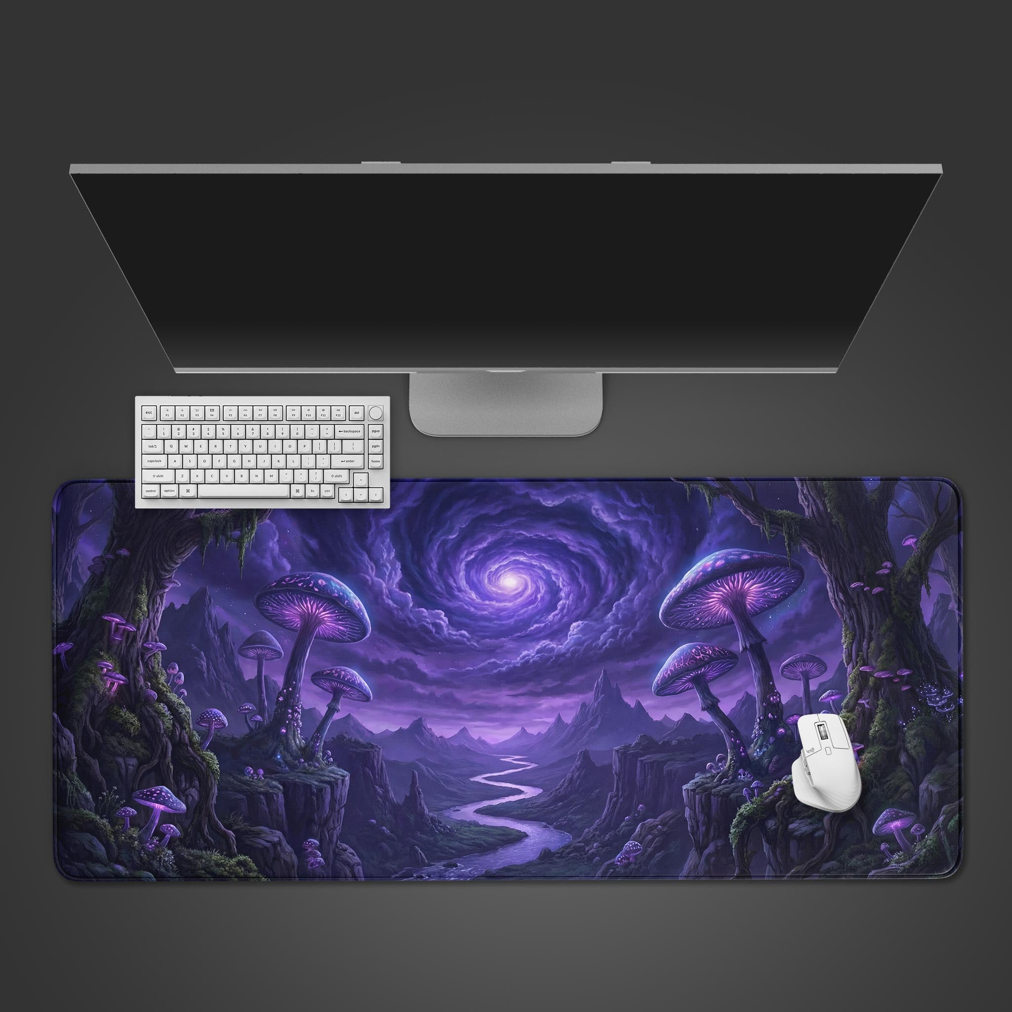The Spore Horizon gaming desk mat shown from above with a white keyboard and mouse, featuring its vibrant purple fantasy mushroom landscape design. - Epic Design Pads & Mousepads