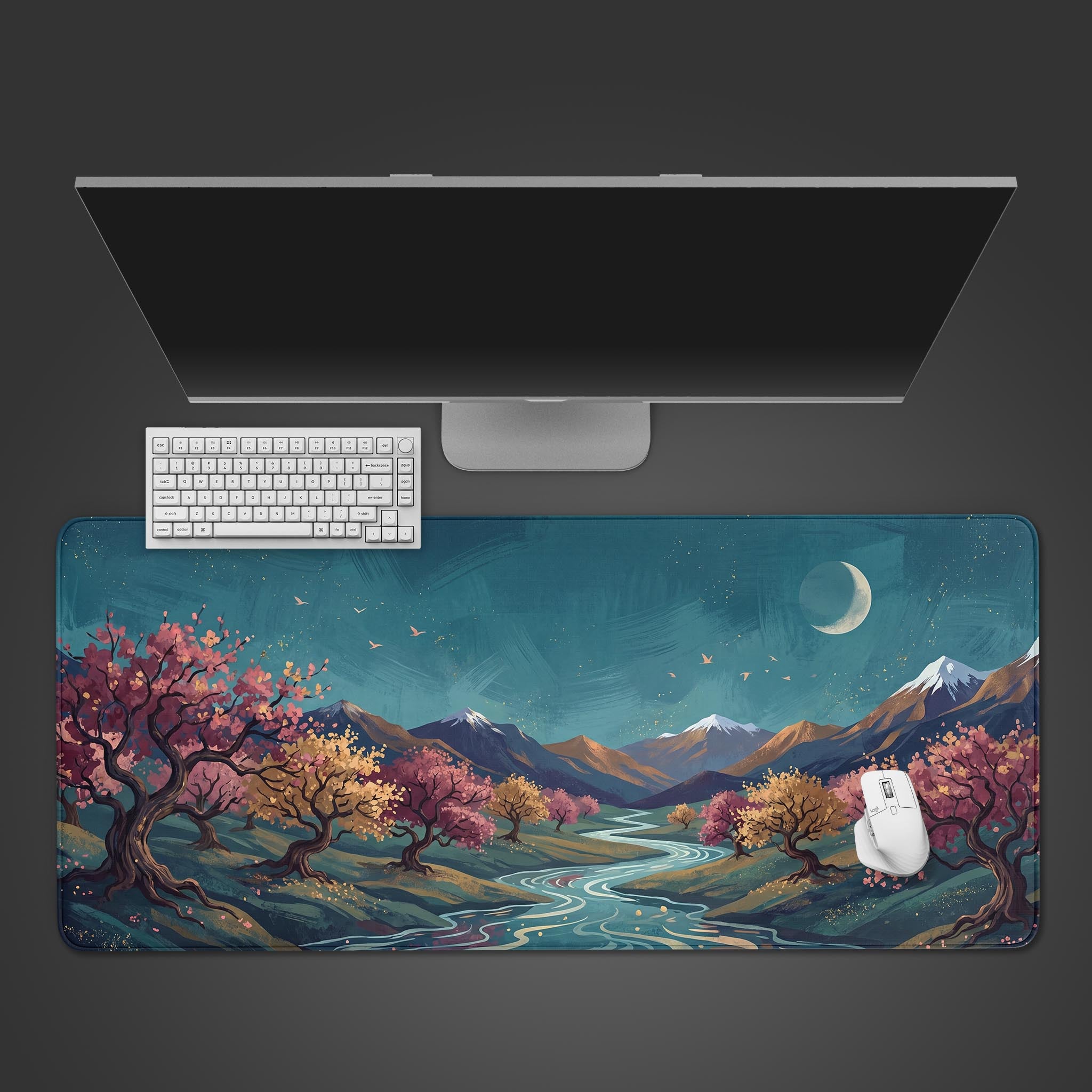 Blossom Valley desk mat featuring a serene winding river and vibrant cherry blossom trees