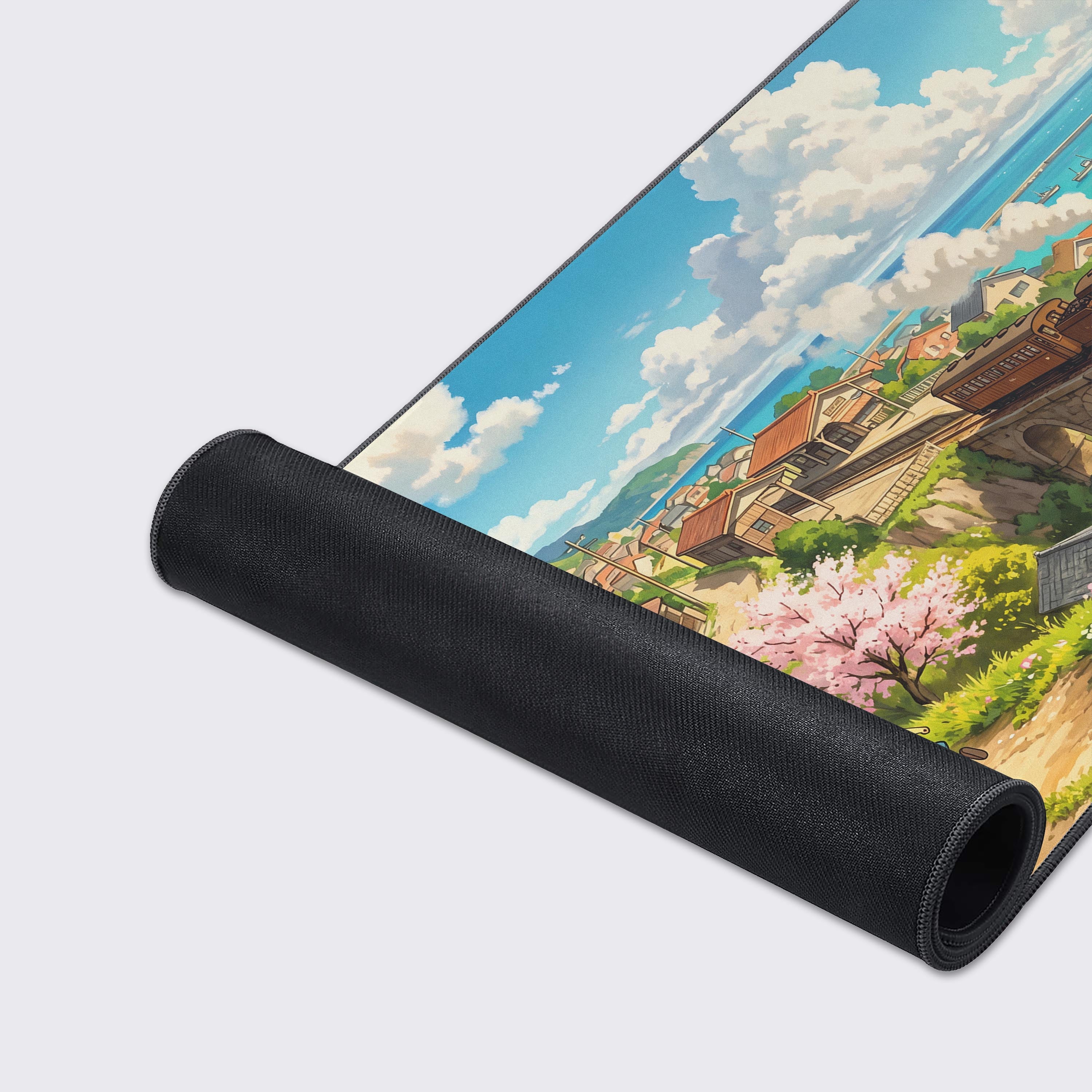 High-quality extended desk mat showcasing a peaceful summer seaside town and train